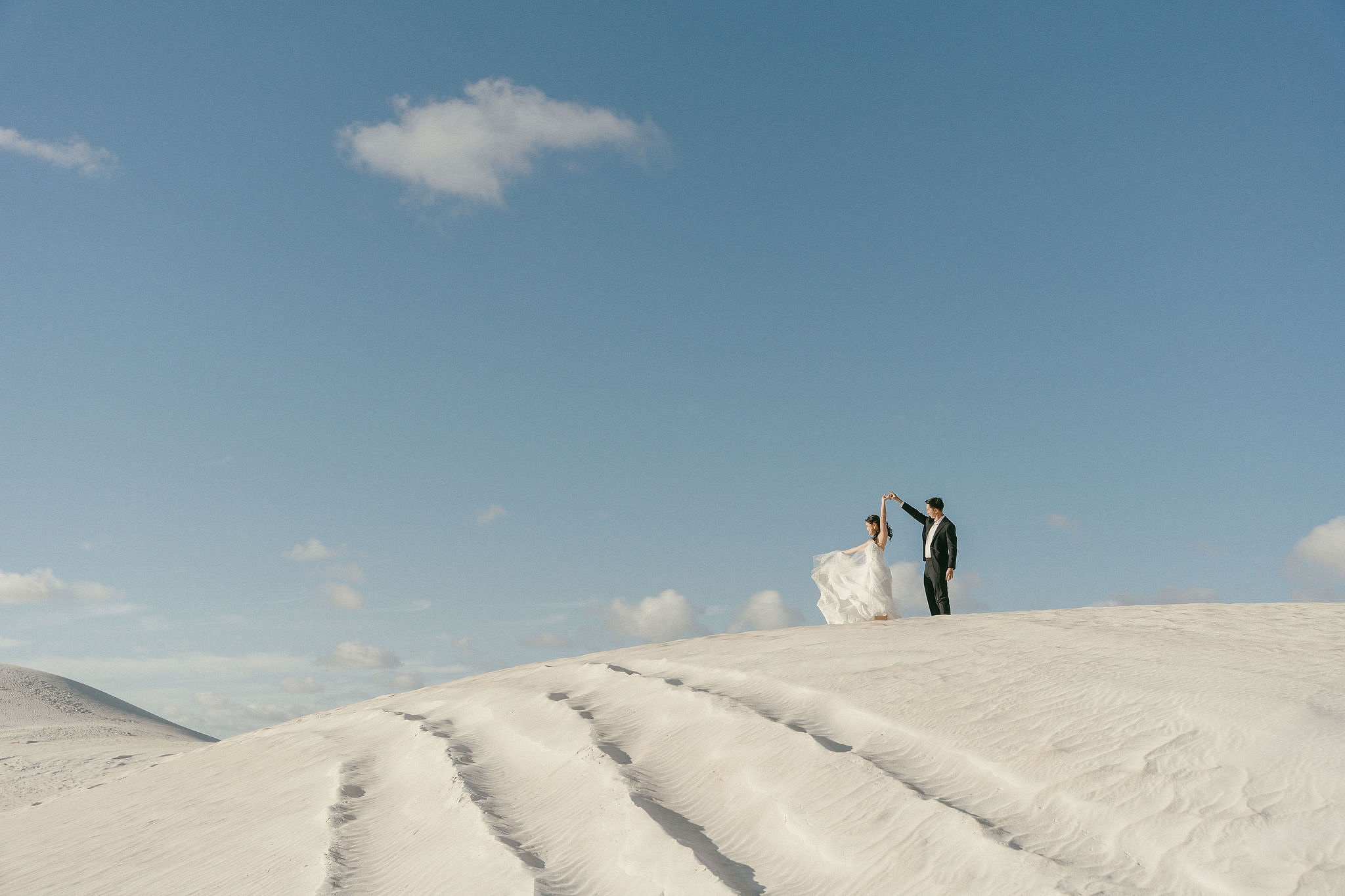 Perth Pre-Wedding Photoshoot | Wanneroo Pines, Yanchep National Park, Lancelin & Lancelin Beach at Lancelin Sand Dunes pre-wedding photo