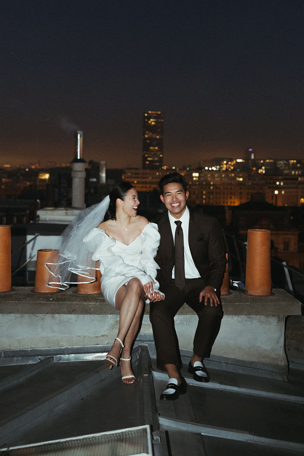 Paris Pre-Wedding Photoshoot with Eiﬀel Tower Louvre Museum Parisian Cafe Vintage Car Rooftop Night at Paris Rooftop pre-wedding photo
