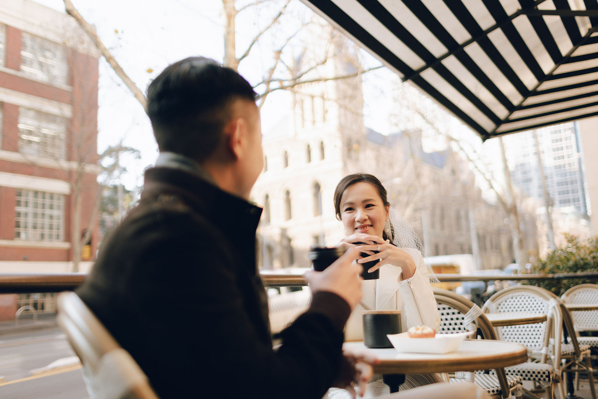 Melbourne Pre-Wedding Photoshoot | Cafe, Redwood Forest, City Streets & Carlton Gardens at City Cafe pre-wedding photo