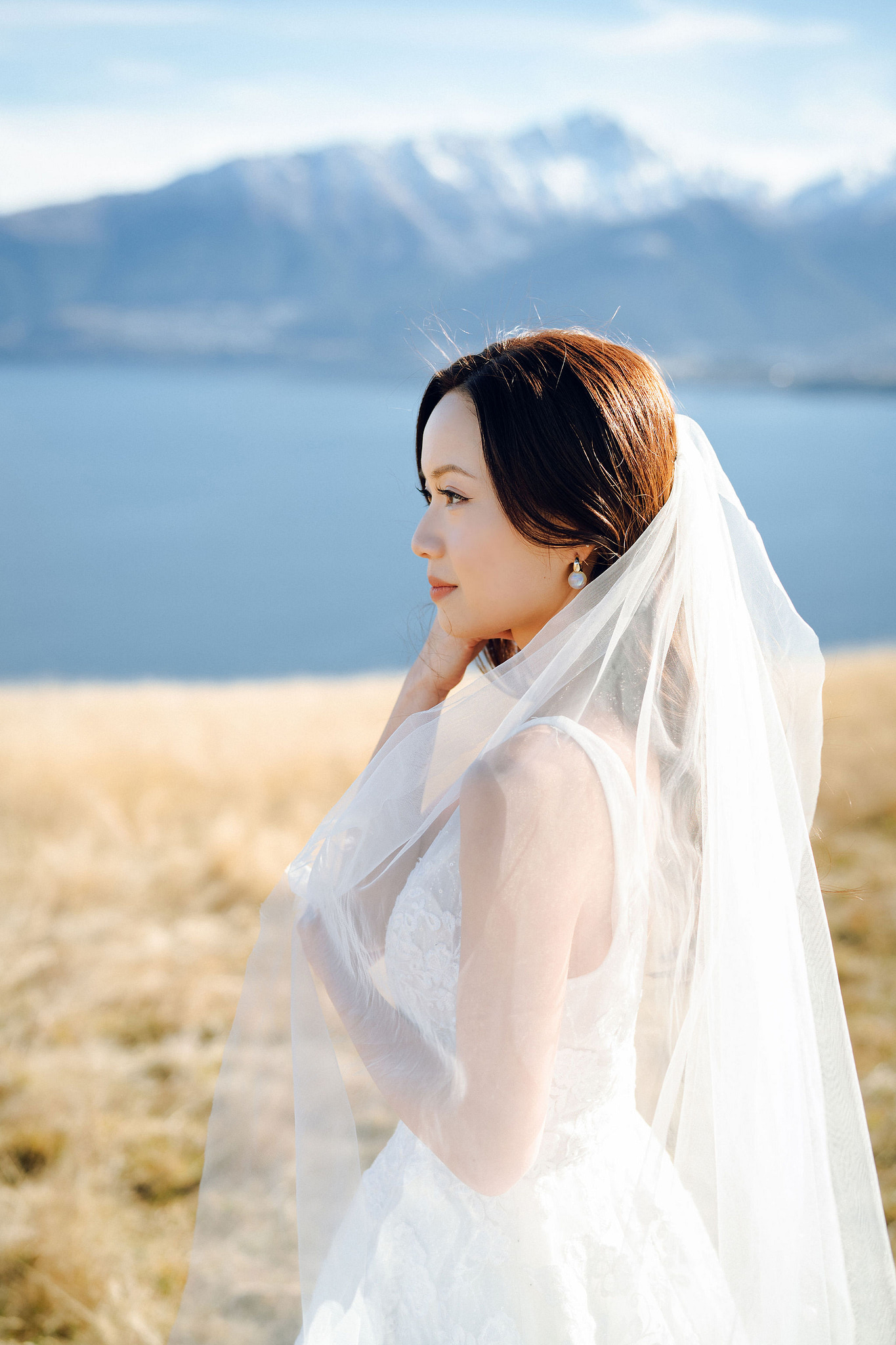 New Zealand Pre-Wedding Photoshoot with Lake Wakatipu, Skippers Canyon, Lake Tekapo, Mount Cook, and Omarama Clay Cliffs at Lake Wakatipu pre-wedding photo