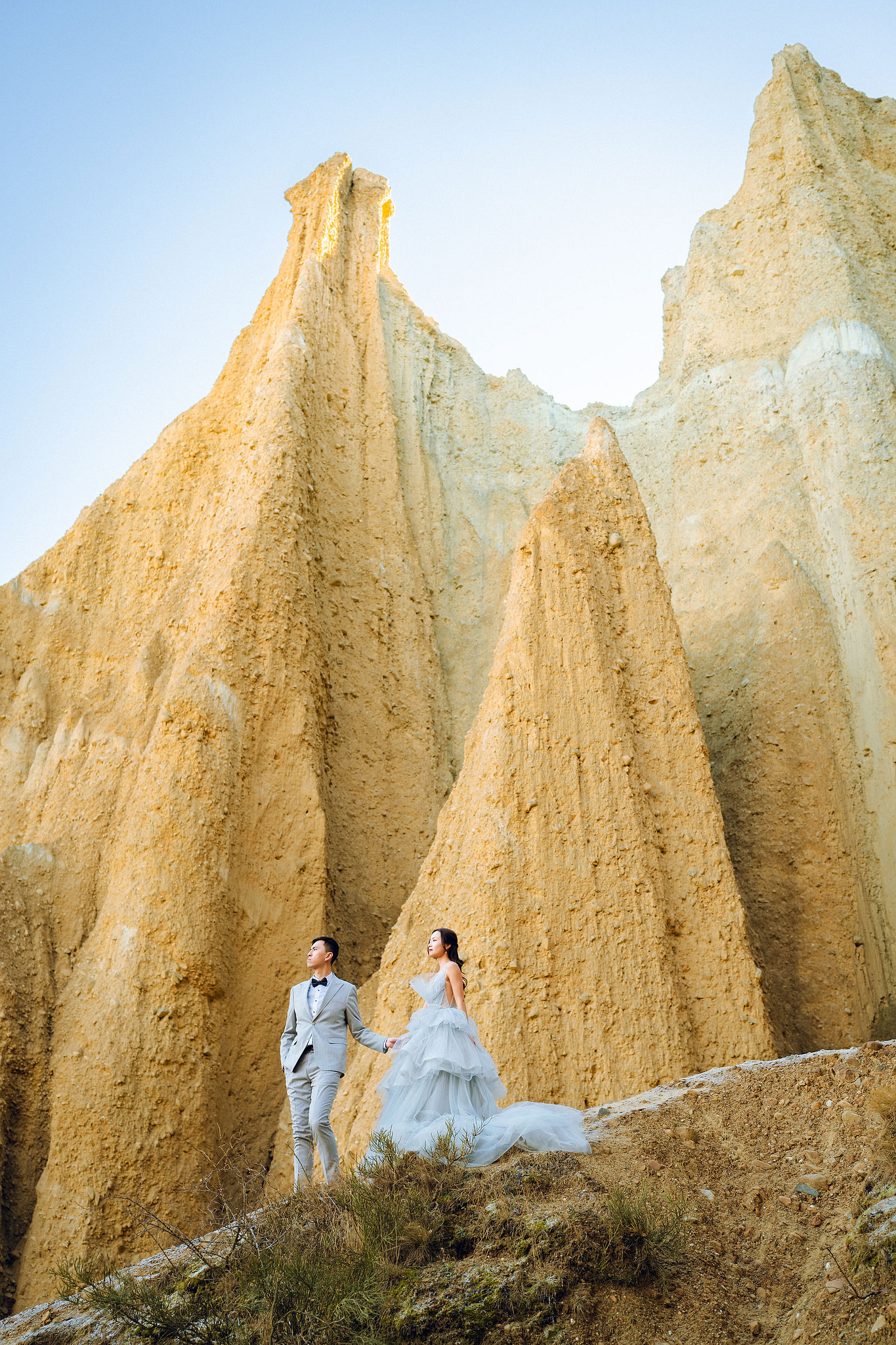 New Zealand Pre-Wedding Photoshoot with Lake Wakatipu, Skippers Canyon, Lake Tekapo, Mount Cook, and Omarama Clay Cliffs at Omarama Clay Cliffs pre-wedding photo