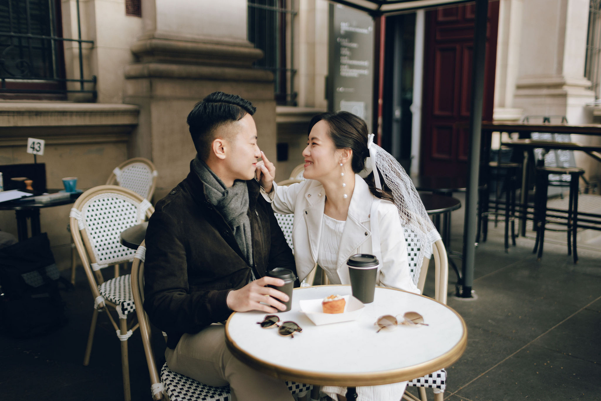Melbourne Pre-Wedding Photoshoot | Cafe, Redwood Forest, City Streets & Carlton Gardens at City Cafe pre-wedding photo