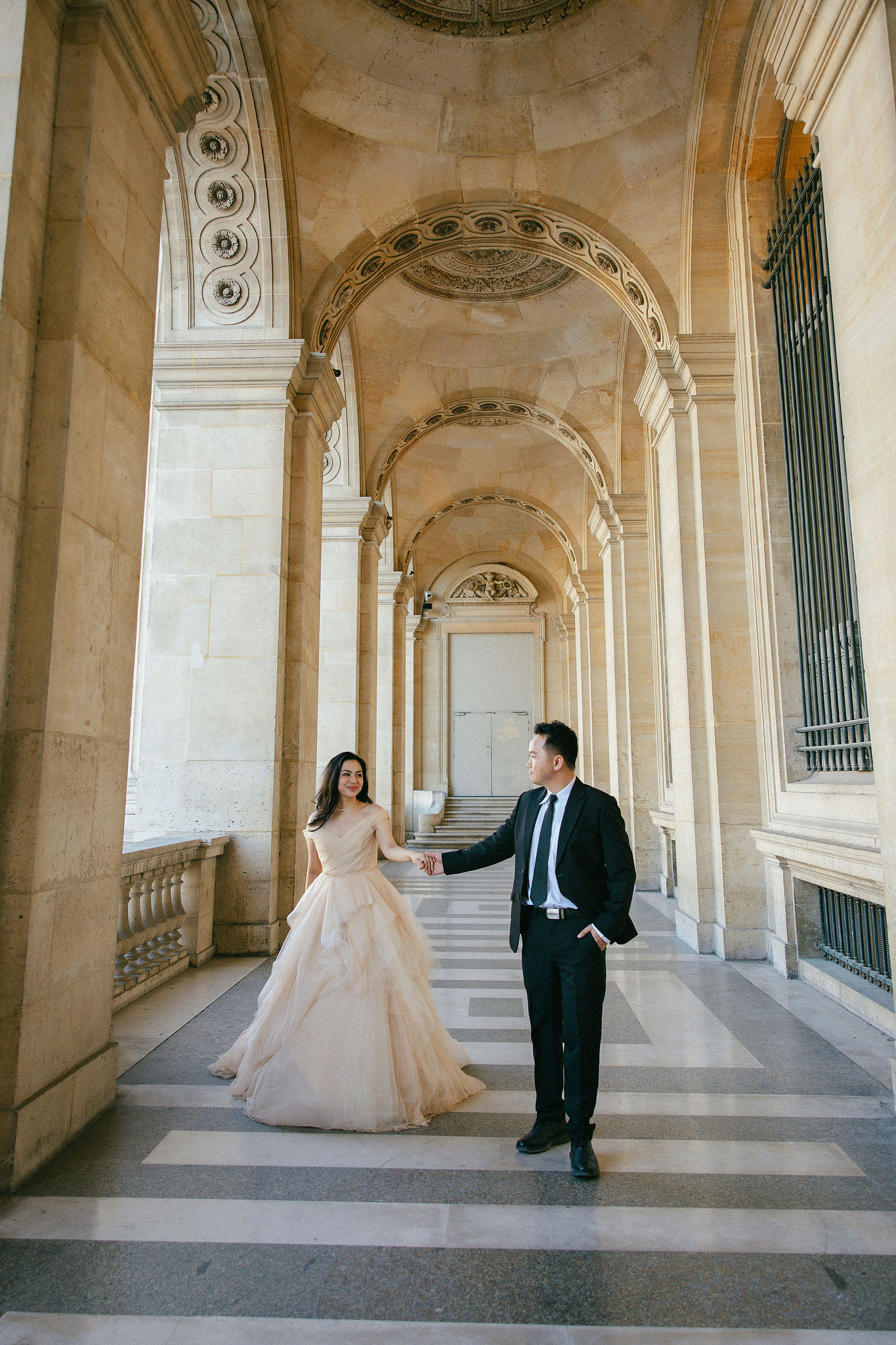 Paris Autumn Pre-Wedding Photoshoot | Avenue de Camoëns, Tuileries Garden, Louvre, Pont Alexandre III & Bir-Hakeim Bridge at Louvre pre-wedding photo