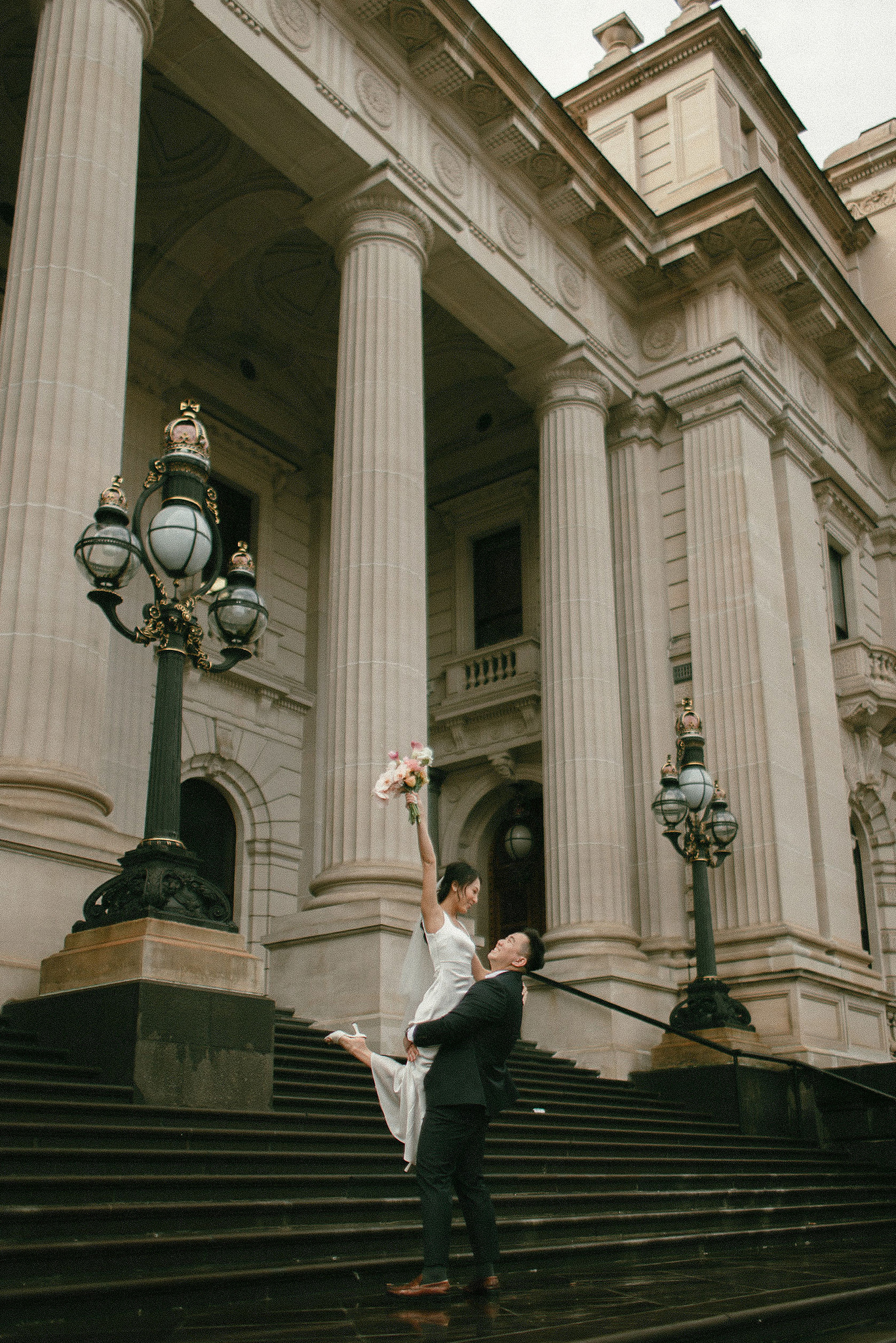 Melbourne Pre-Wedding Photoshoot | Parliament House, Fitzroy Gardens, Melbourne Streets & Half Moon Bay at Parliament House pre-wedding photo