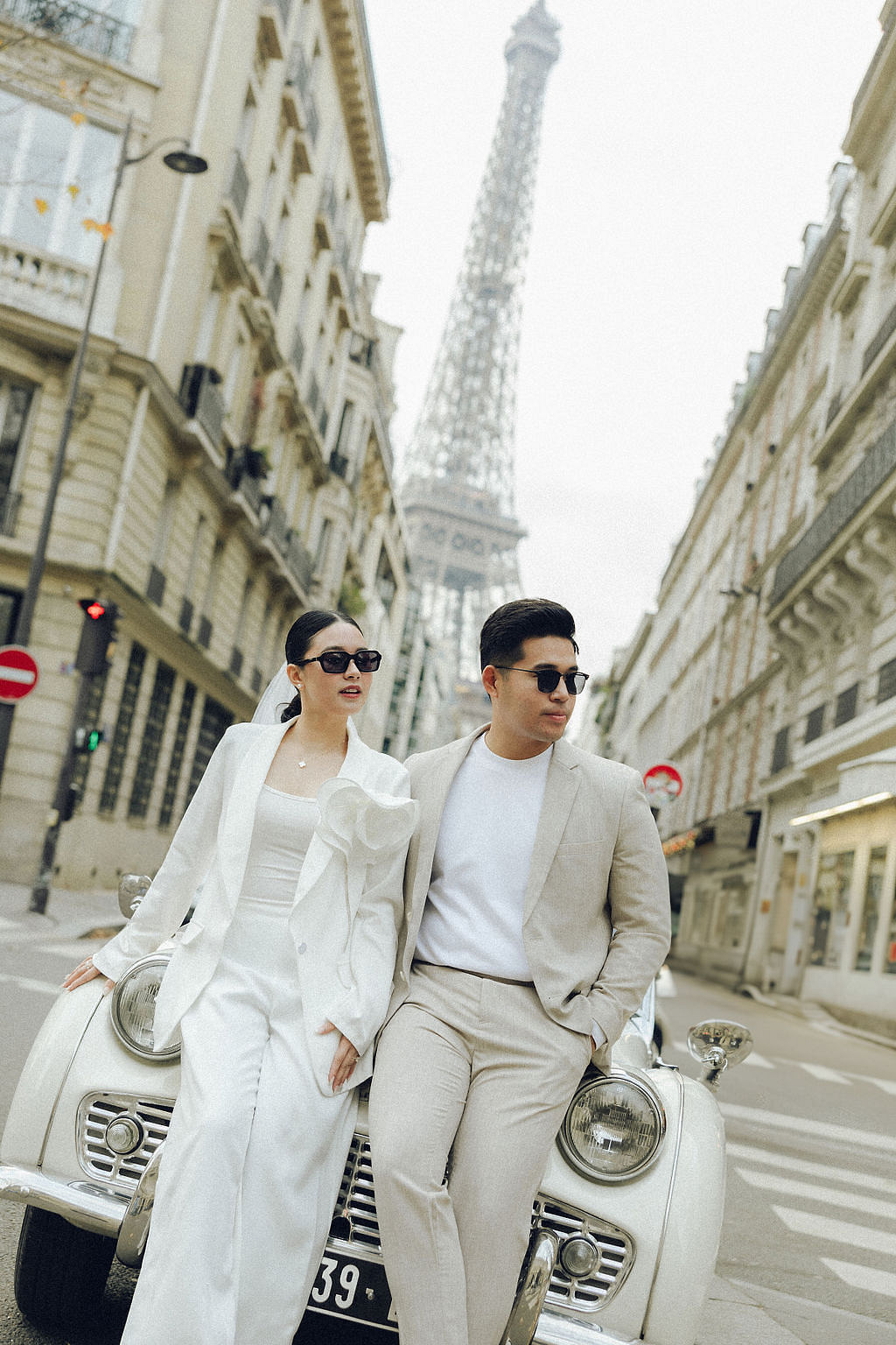 Paris Pre-Wedding Photoshoot with Eiﬀel Tower Louvre Museum Parisian Cafe Vintage Car Rooftop Night at Parisian Streets pre-wedding photo