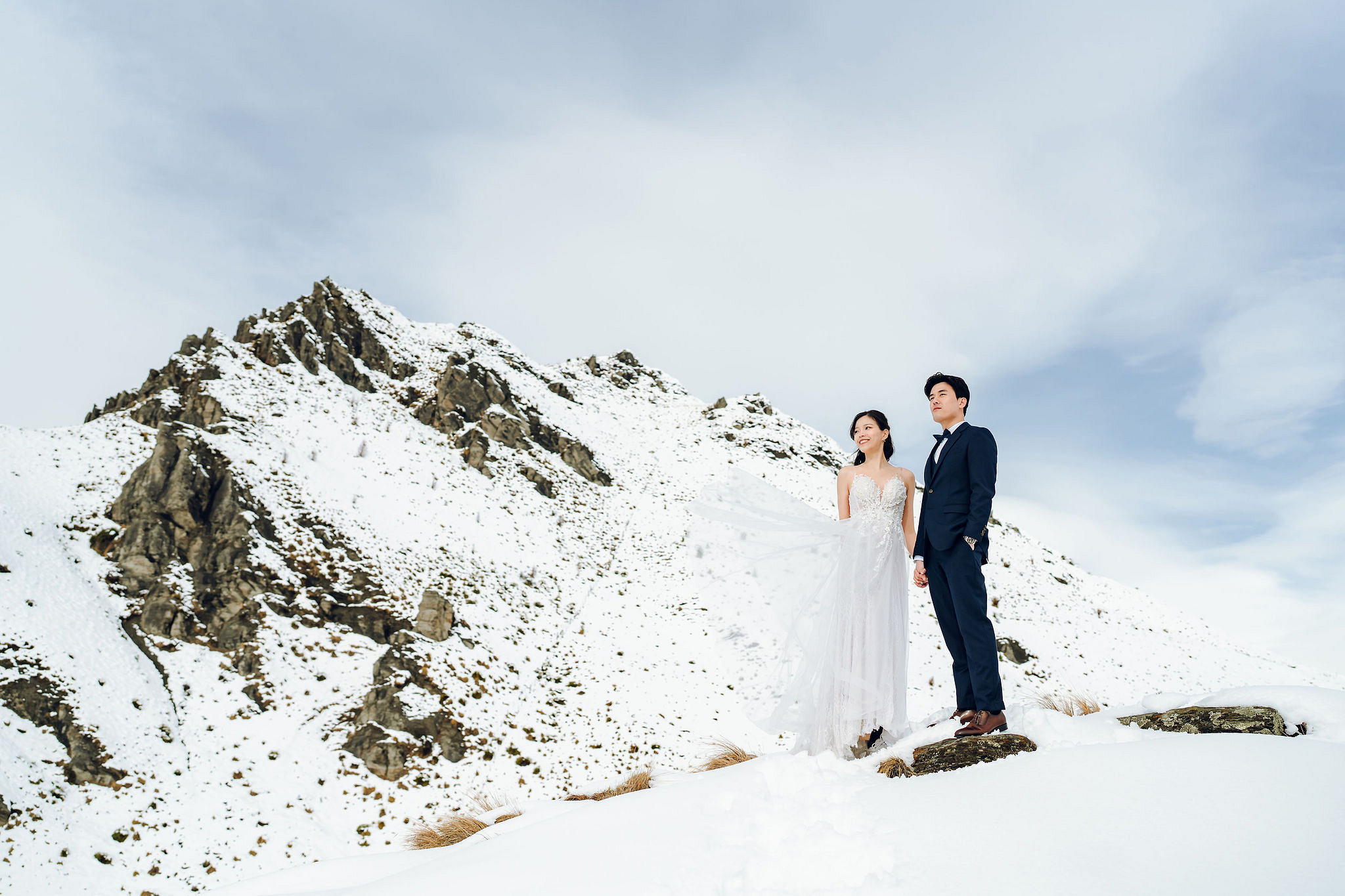 New Zealand Pre-Wedding Photoshoot | Cherry Blossoms, Coromandel Peak & Lake Wakatipu at Coromandel Peak pre-wedding photo