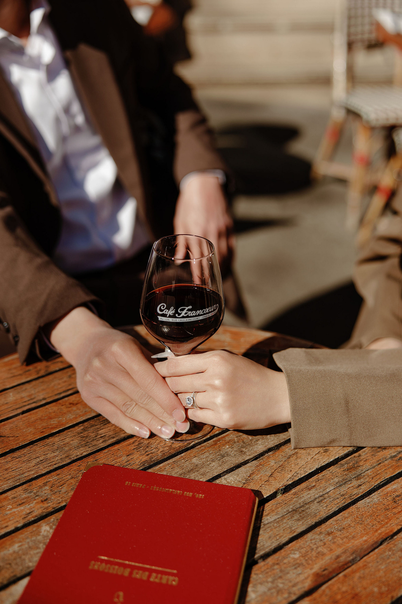 Paris Pre-Wedding Photoshoot | Place du Trocadéro, Bir-Hakeim Bridge, Sacré-Cœur Basilica, Parisian Café & Palais Royal at Parisian Café pre-wedding photo