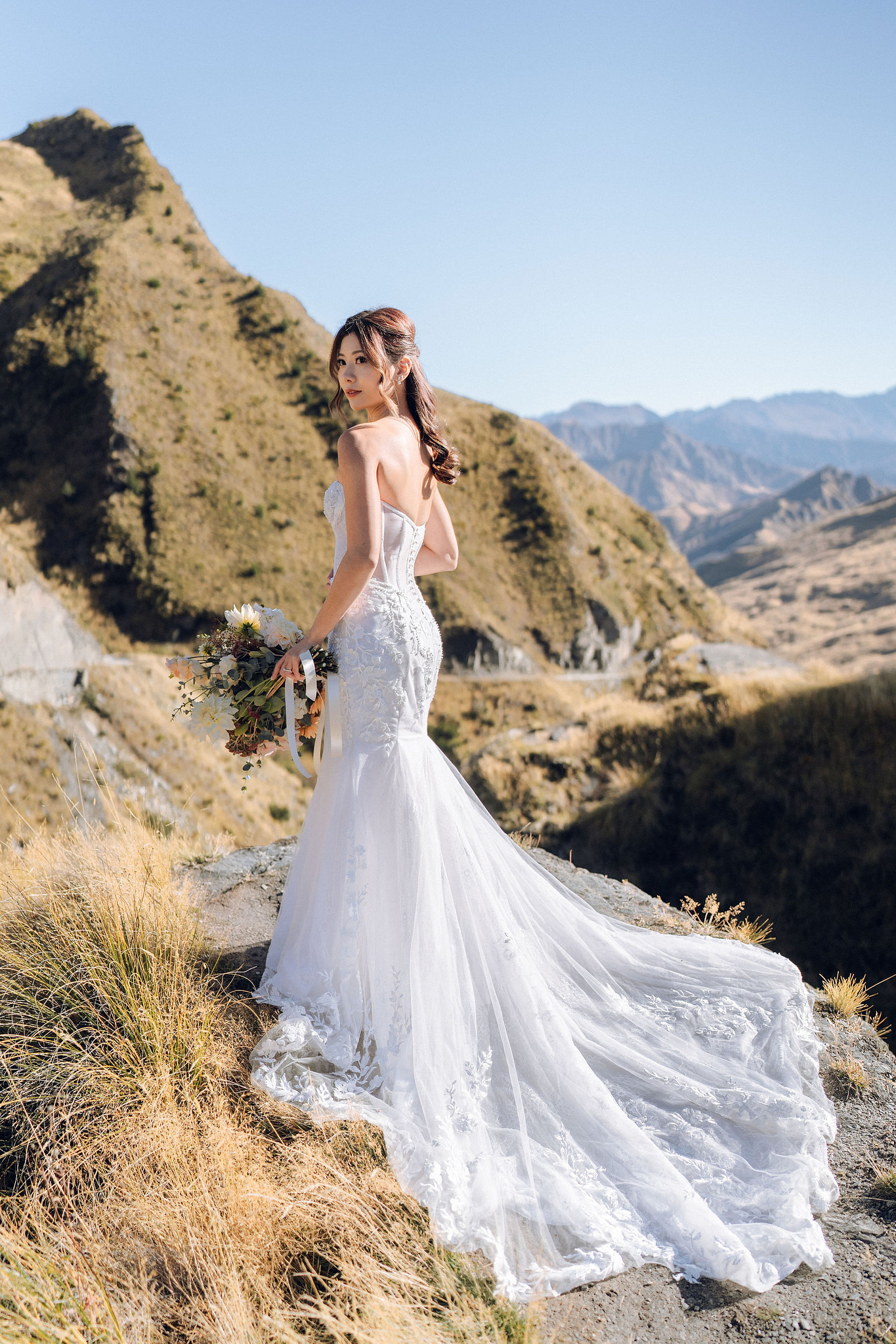 New Zealand Autumn Pre-Wedding Photoshoot Twin Peak Skippers Canyon Alpaca Farm Hilltop Cardrona Night Shoot Kombi Van at Skippers Canyon pre-wedding photo