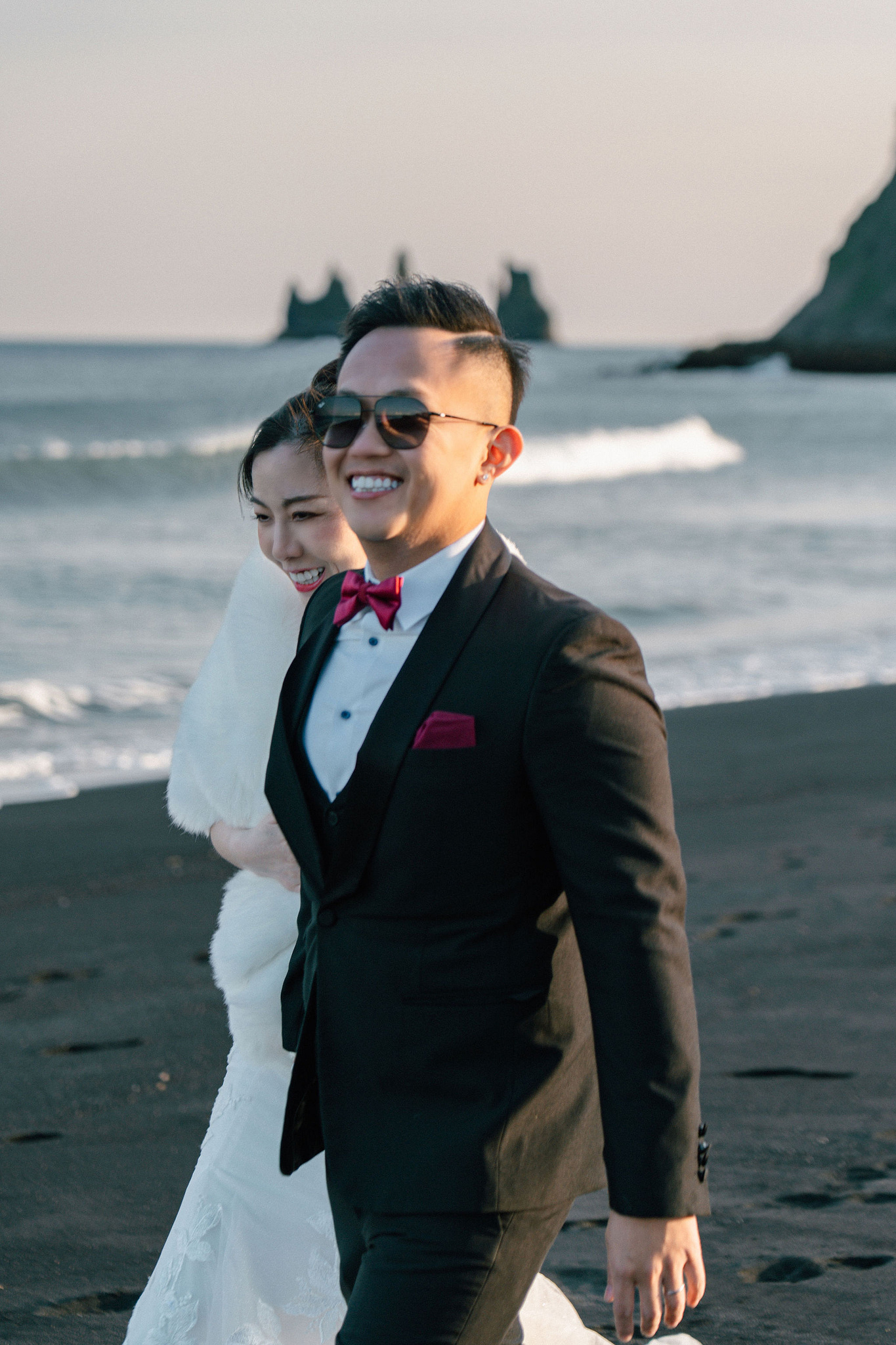 Iceland Pre-Wedding Photoshoot | Hallgrimskirkja, Skogafoss, DC Plane Wreck & Black Sand Beach at Black Sand Beach & Vik Church pre-wedding photo