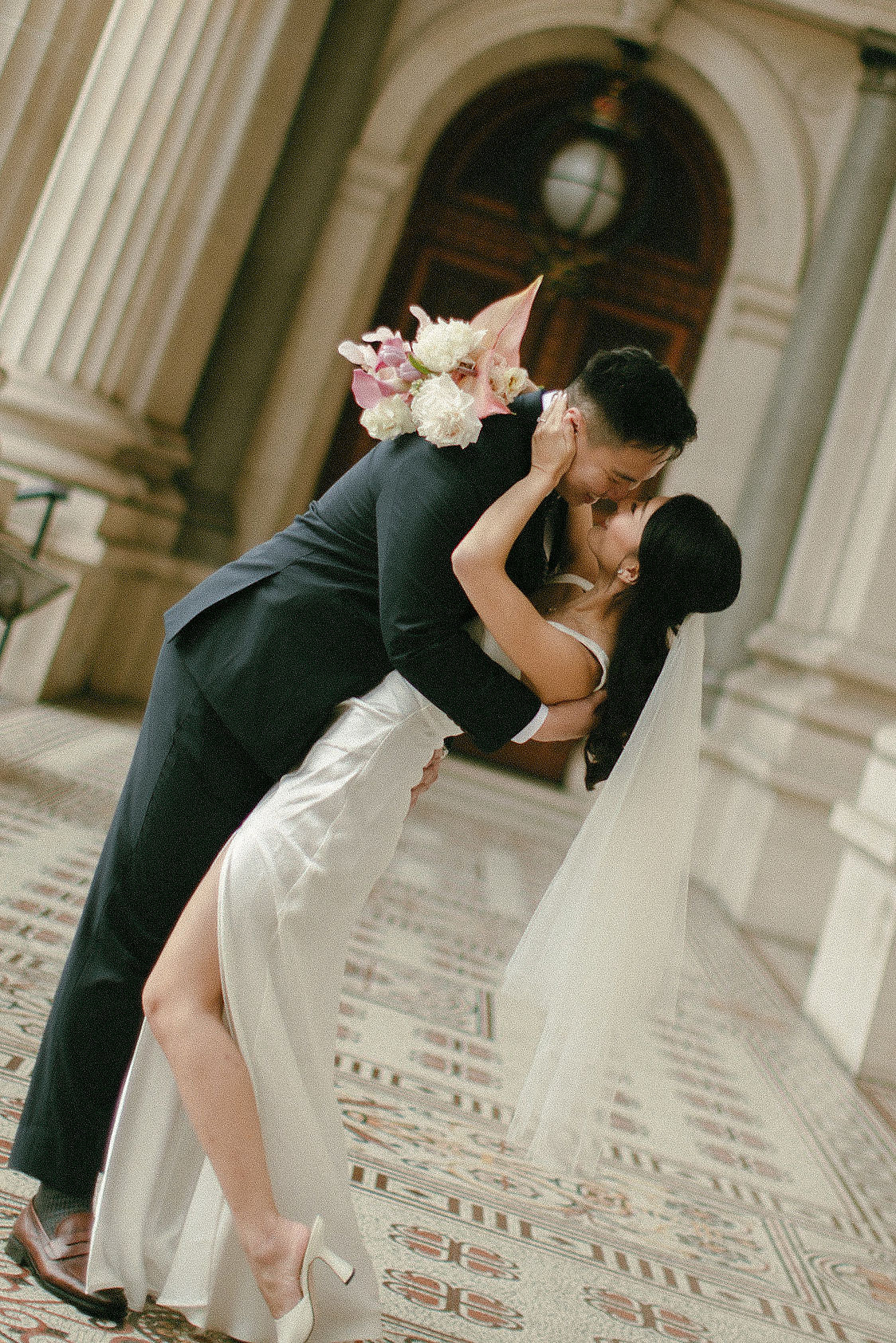 Melbourne Pre-Wedding Photoshoot | Parliament House, Fitzroy Gardens, Melbourne Streets & Half Moon Bay at Parliament House pre-wedding photo