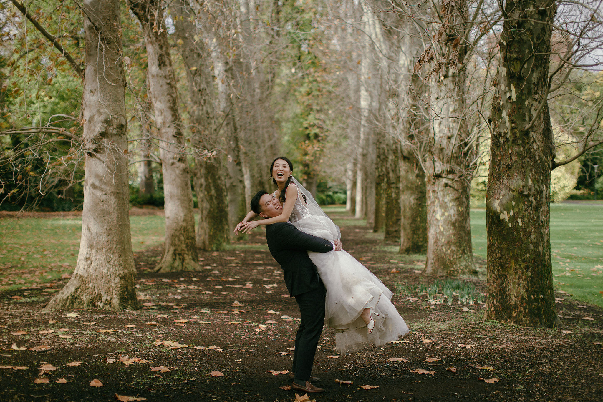 Melbourne Pre-Wedding Photoshoot | Parliament House, Fitzroy Gardens, Melbourne Streets & Half Moon Bay at Fitzroy Gardens pre-wedding photo