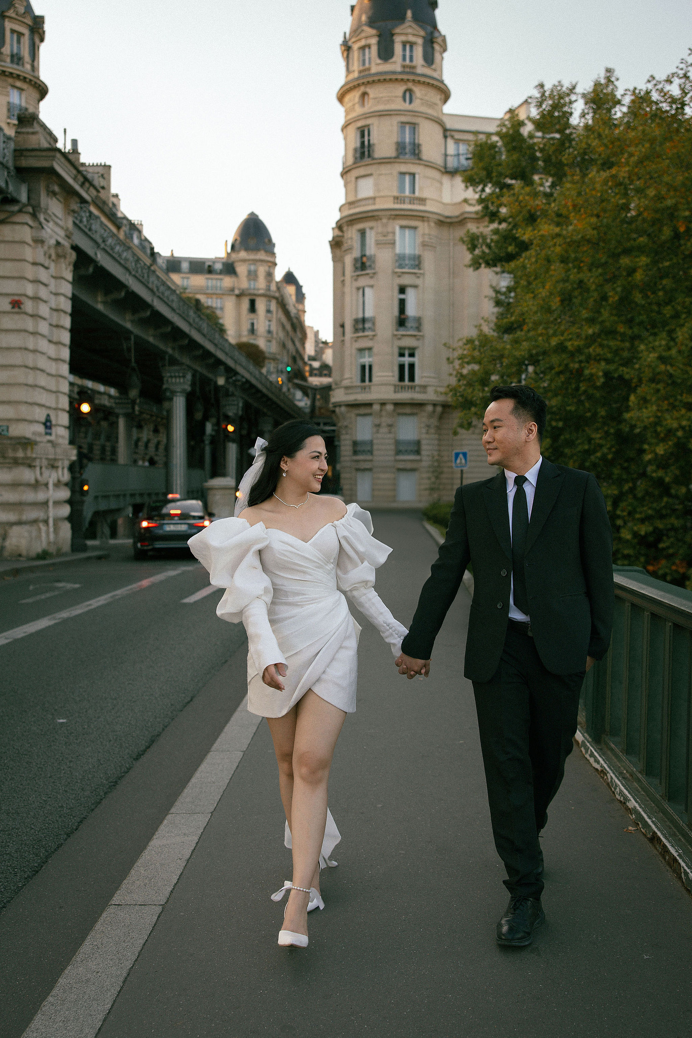 Paris Autumn Pre-Wedding Photoshoot | Avenue de Camoëns, Tuileries Garden, Louvre, Pont Alexandre III & Bir-Hakeim Bridge at Bir-Hakeim Bridge pre-wedding photo