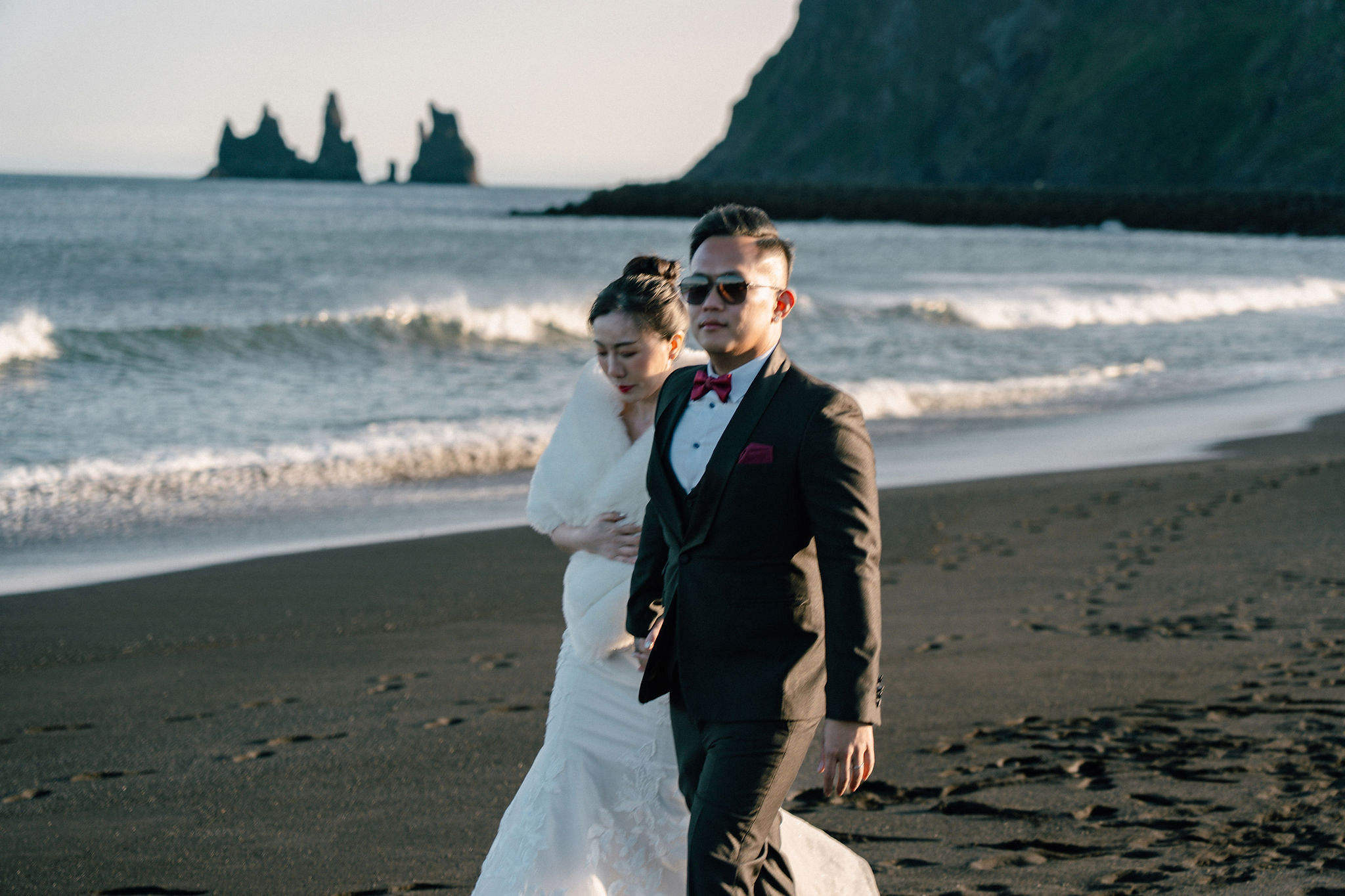 Iceland Pre-Wedding Photoshoot | Hallgrimskirkja, Skogafoss, DC Plane Wreck & Black Sand Beach at Black Sand Beach & Vik Church pre-wedding photo