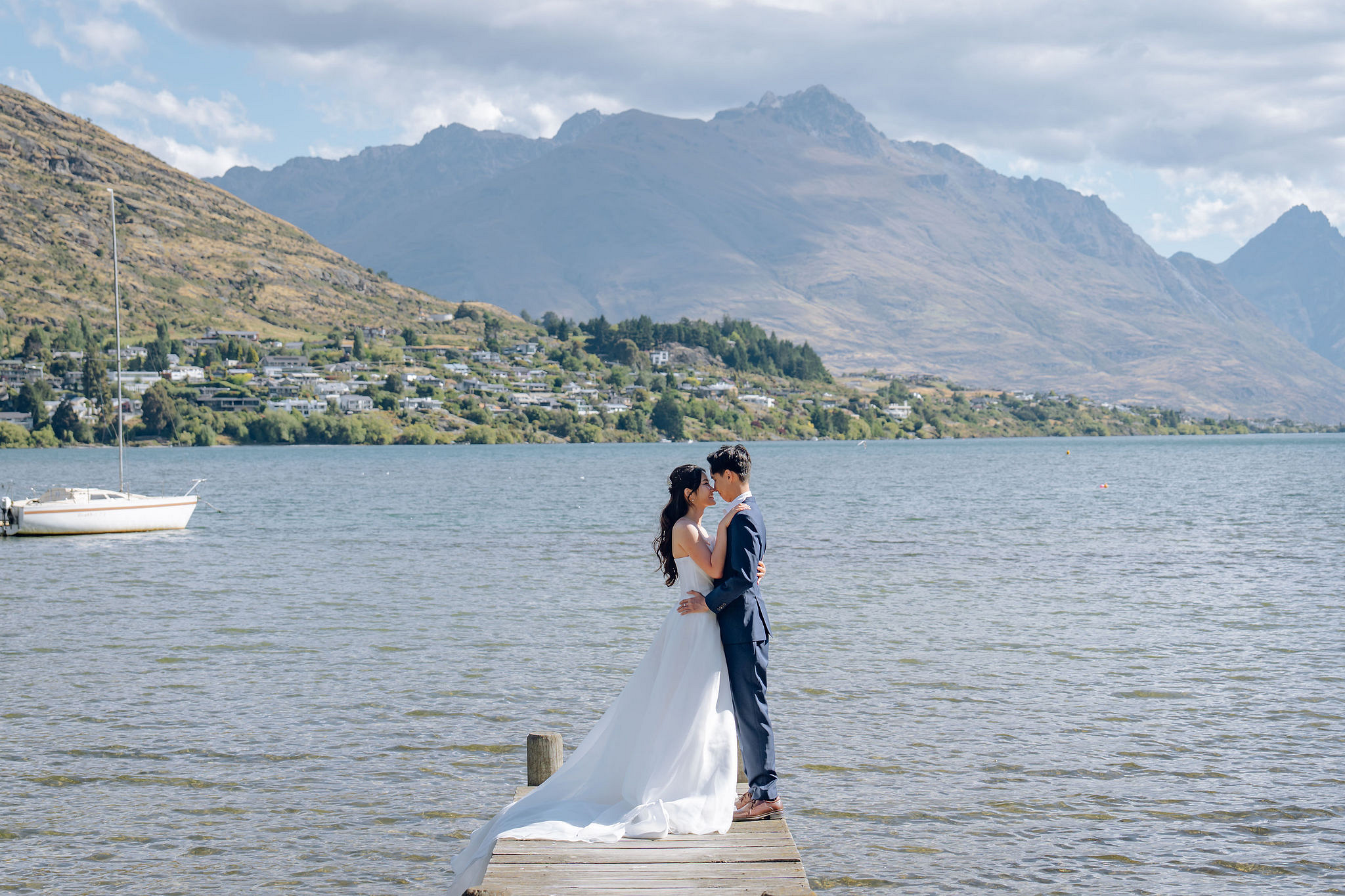 New Zealand Pre-Wedding Photoshoot | Coromandel Peak, Queenstown Highway & Alpaca Farm at Frankton Beach Boat Pier pre-wedding photo
