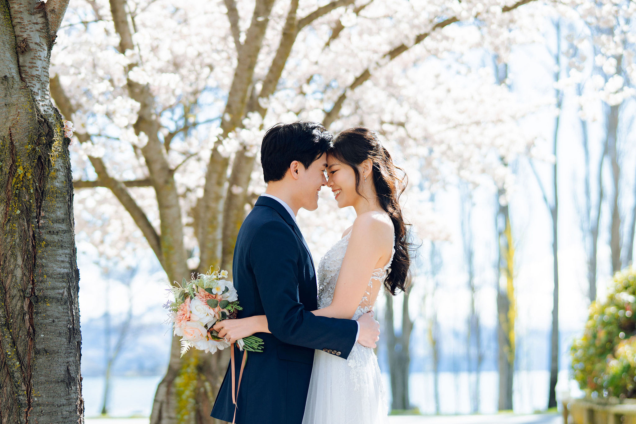 New Zealand Pre-Wedding Photoshoot | Cherry Blossoms, Coromandel Peak & Lake Wakatipu at Cherry Blossoms pre-wedding photo