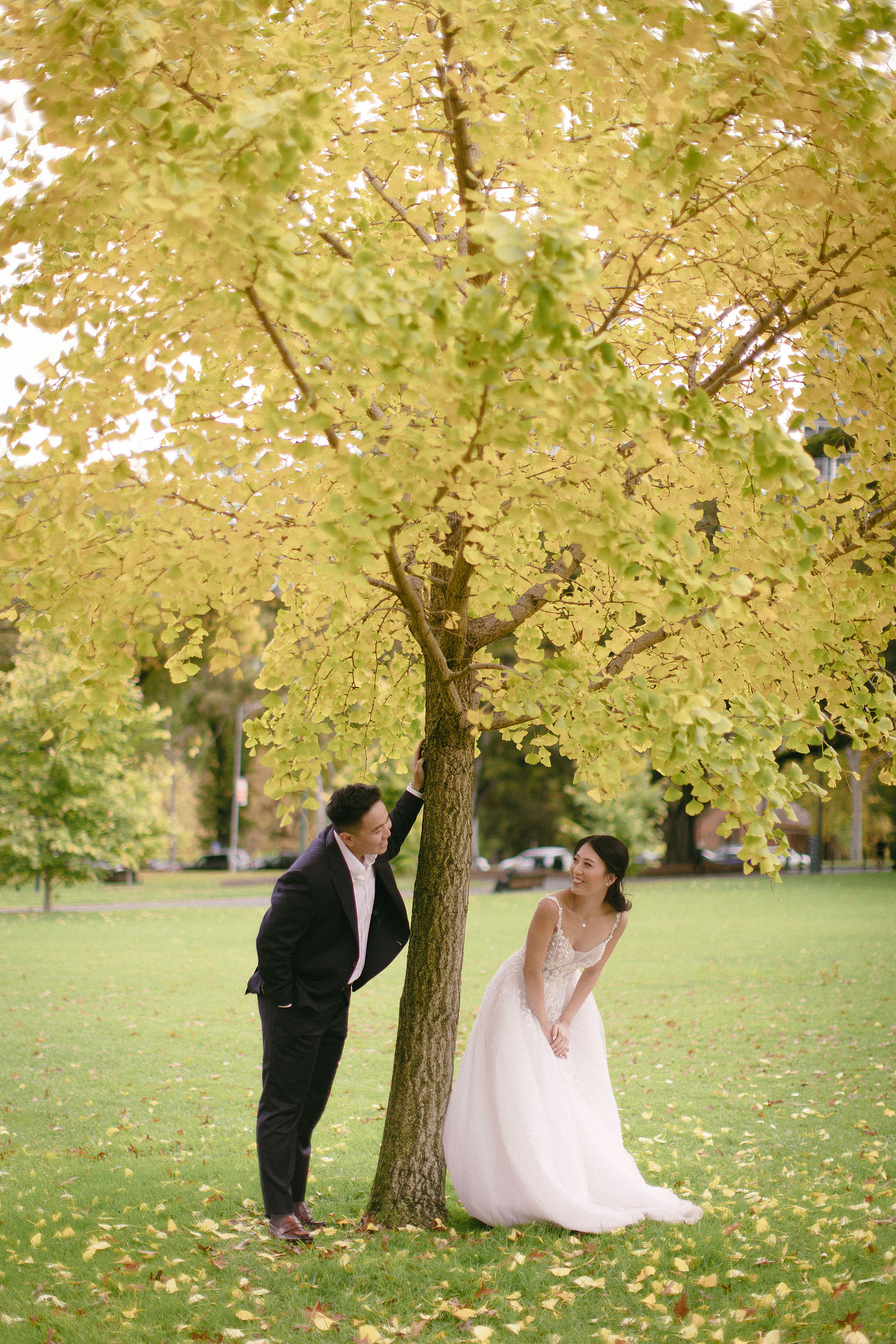 Melbourne Pre-Wedding Photoshoot | Parliament House, Fitzroy Gardens, Melbourne Streets & Half Moon Bay at Fitzroy Gardens pre-wedding photo