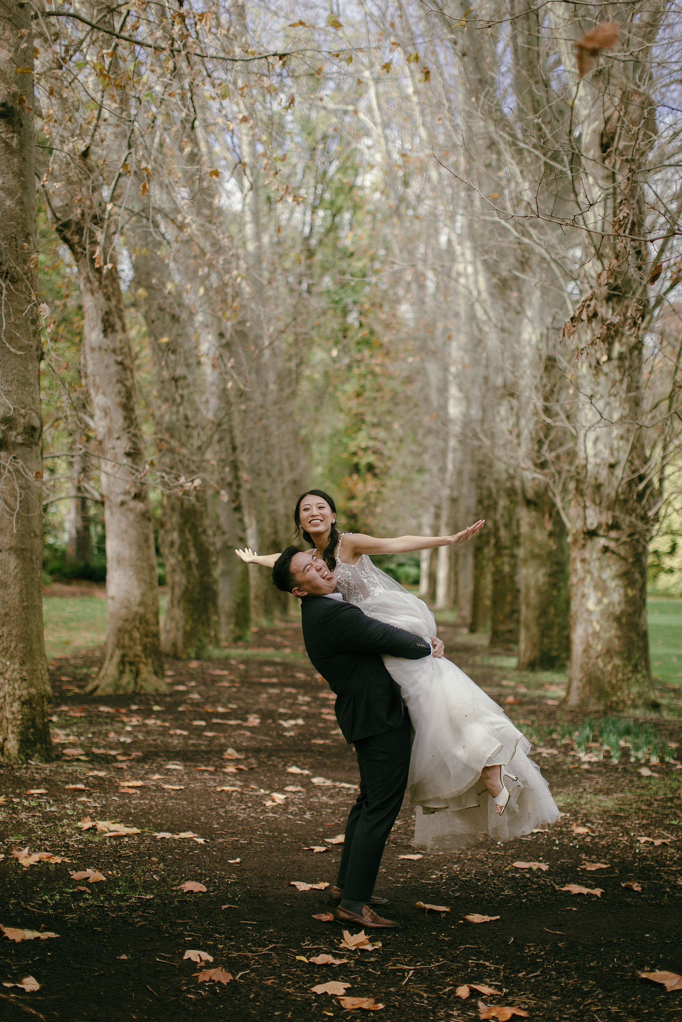 Melbourne Pre-Wedding Photoshoot | Parliament House, Fitzroy Gardens, Melbourne Streets & Half Moon Bay at Fitzroy Gardens pre-wedding photo