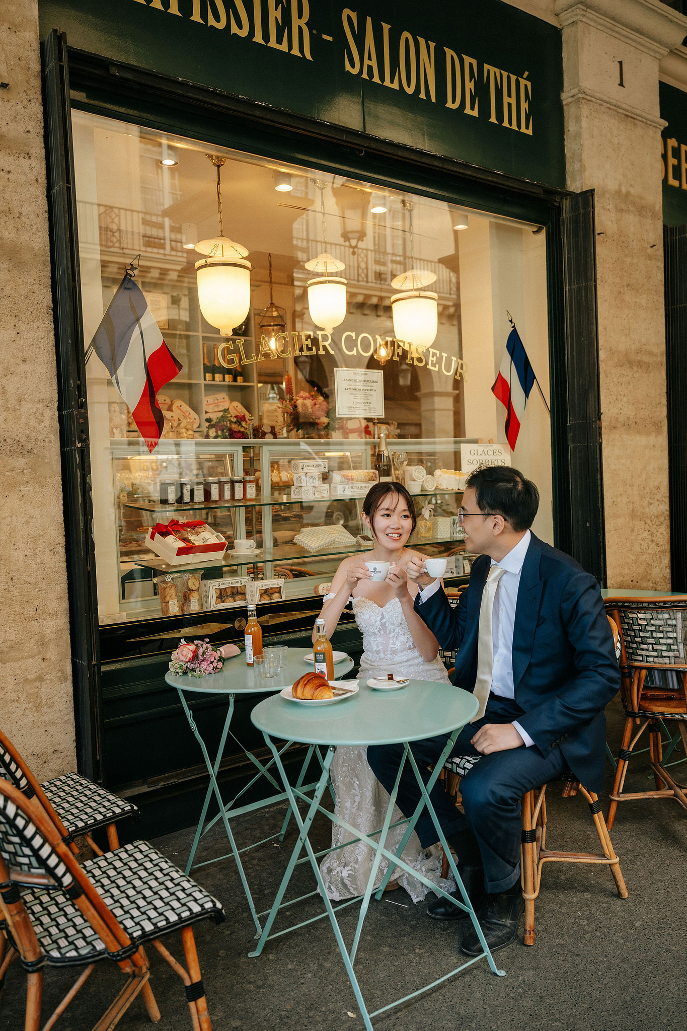 Paris Pre-Wedding Photoshoot | Place du Trocadéro, Port Debilly, Petit Palais, Pont Alexandre III, Parisian Café & Louvre Pyramid at Parisian Café pre-wedding photo