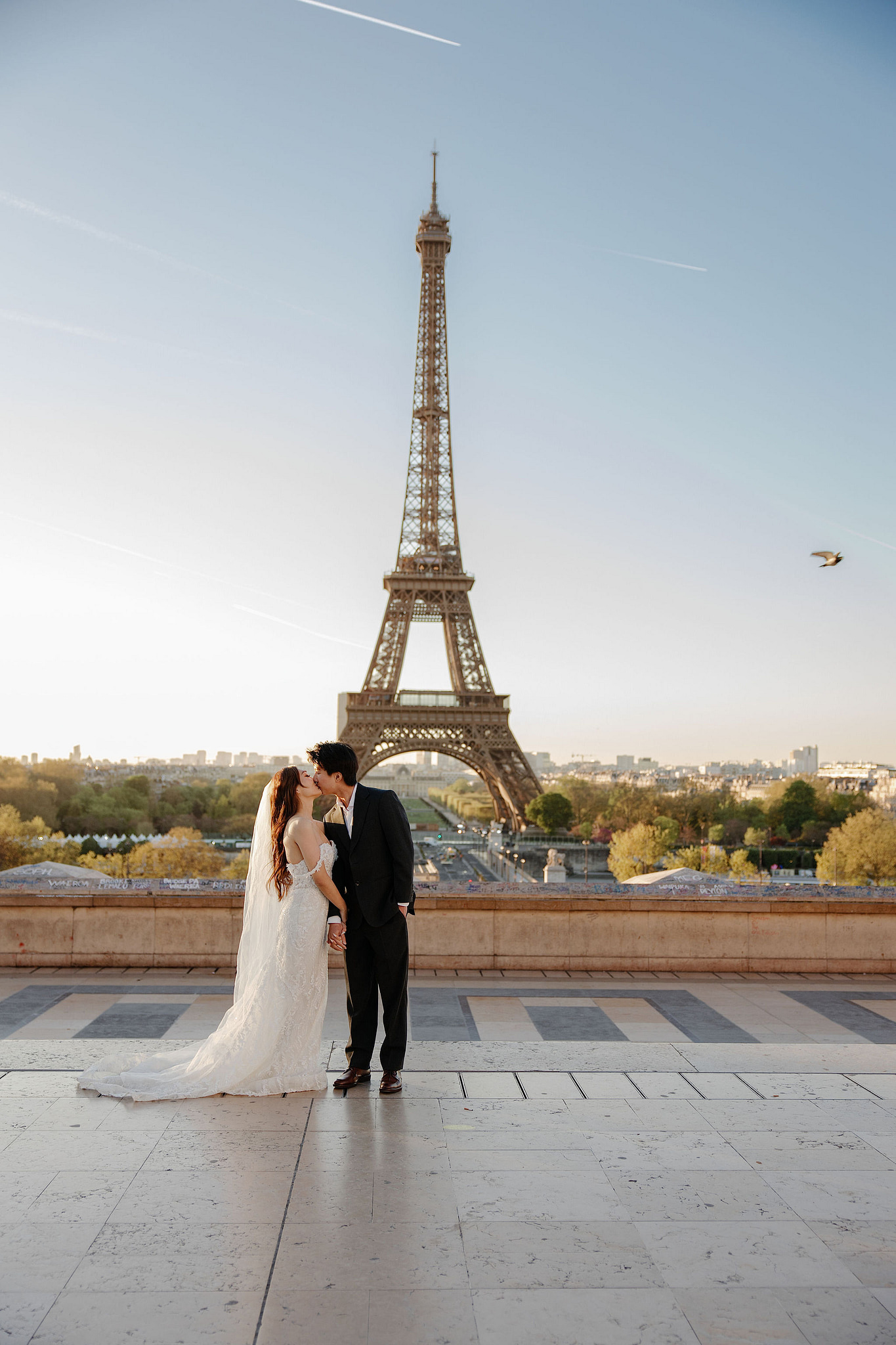 Paris Pre-Wedding Photoshoot | Place du Trocadéro, Bir-Hakeim Bridge, Sacré-Cœur Basilica, Parisian Café & Palais Royal at Place du Trocadéro pre-wedding photo