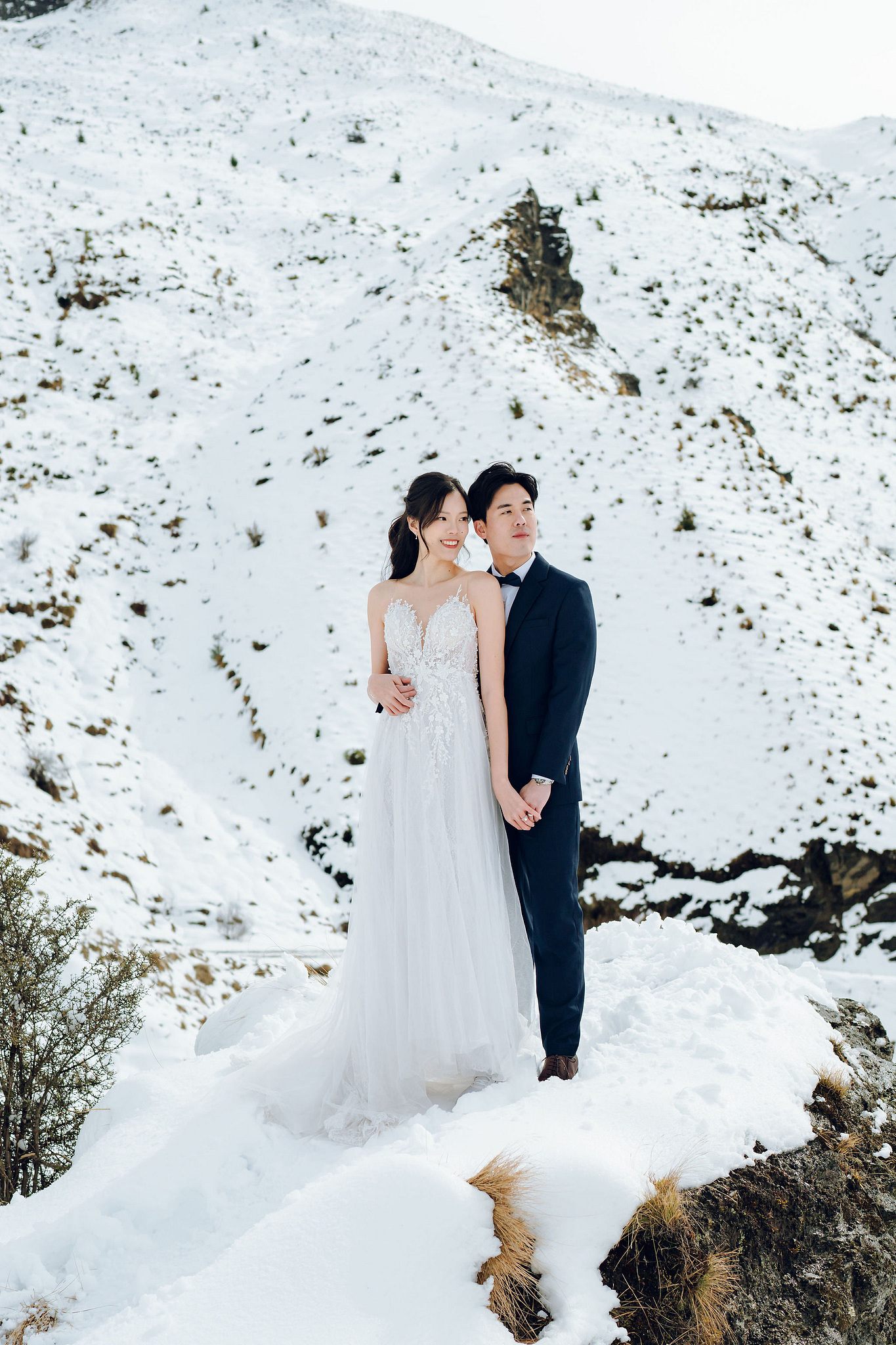New Zealand Pre-Wedding Photoshoot | Cherry Blossoms, Coromandel Peak & Lake Wakatipu at Coromandel Peak pre-wedding photo