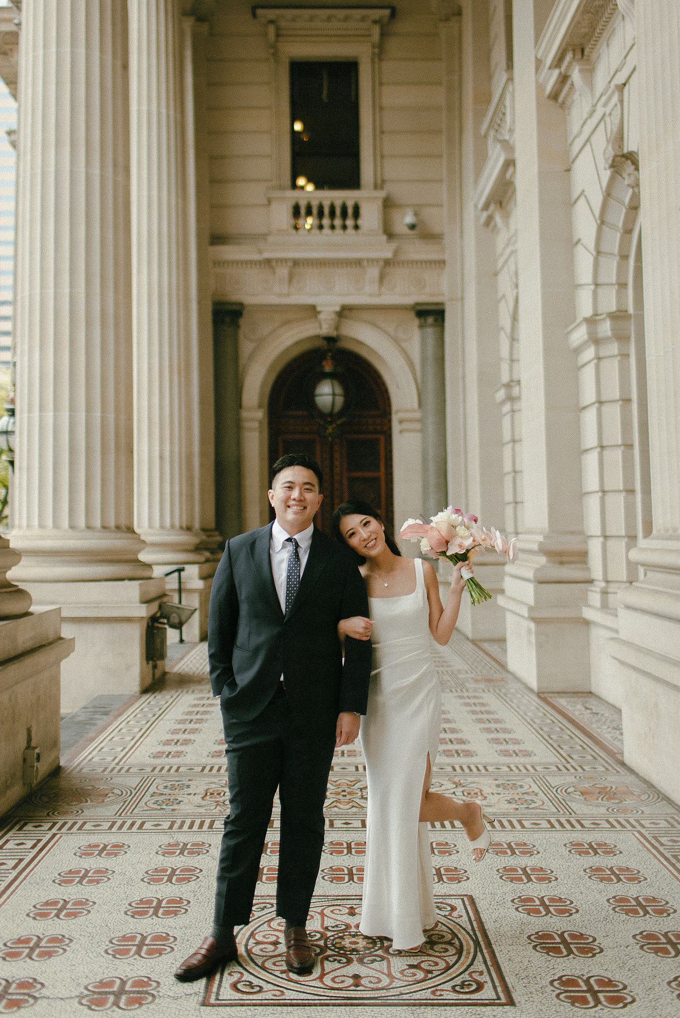 Melbourne Pre-Wedding Photoshoot | Parliament House, Fitzroy Gardens, Melbourne Streets & Half Moon Bay at Parliament House pre-wedding photo