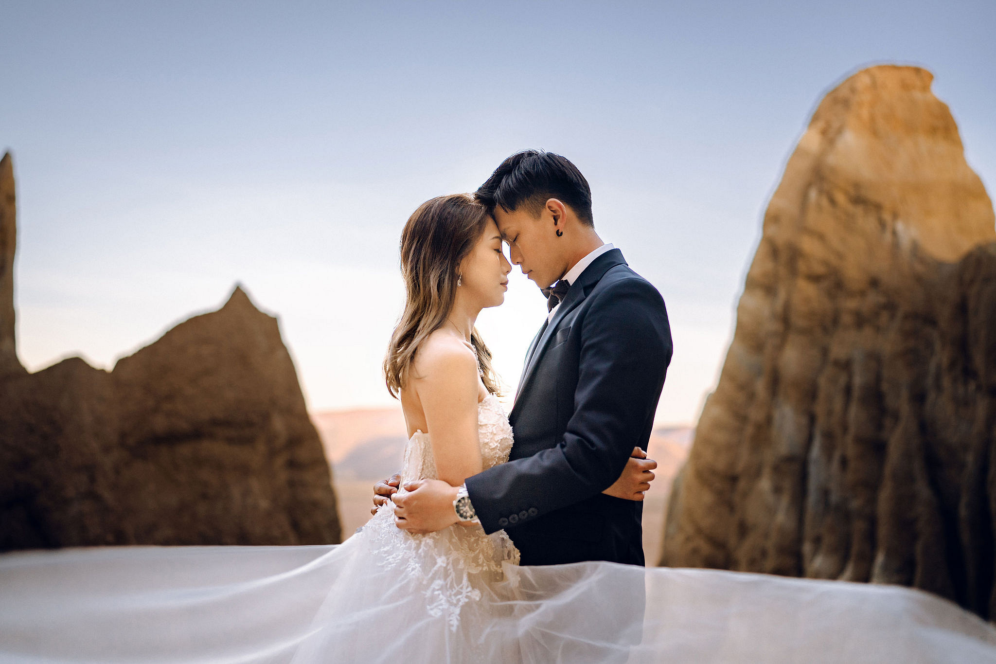 New Zealand Pre-Wedding Photoshoot | Alpaca Farm, Mt John, Lake Tekapo, Mount Cook National Park, Glacier Lake & Omarama Clay Cliffs at Omarama Clay Cliffs pre-wedding photo