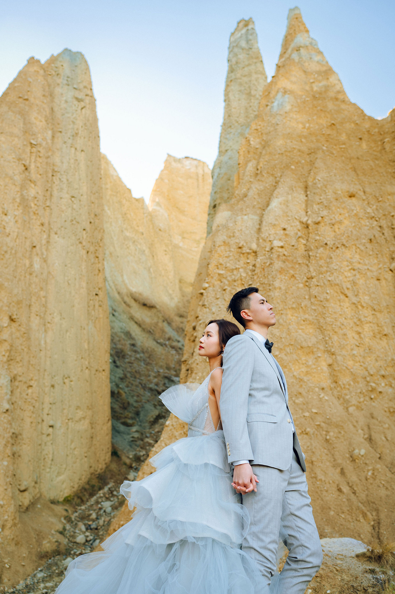 New Zealand Pre-Wedding Photoshoot with Lake Wakatipu, Skippers Canyon, Lake Tekapo, Mount Cook, and Omarama Clay Cliffs at Omarama Clay Cliffs pre-wedding photo