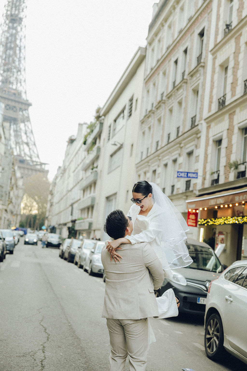 Paris Pre-Wedding Photoshoot with Eiﬀel Tower Louvre Museum Parisian Cafe Vintage Car Rooftop Night at Parisian Streets pre-wedding photo