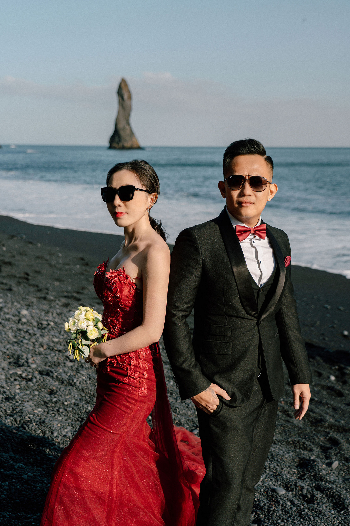 Iceland Pre-Wedding Photoshoot | Hallgrimskirkja, Skogafoss, DC Plane Wreck & Black Sand Beach at Black Sand Beach & Vik Church pre-wedding photo