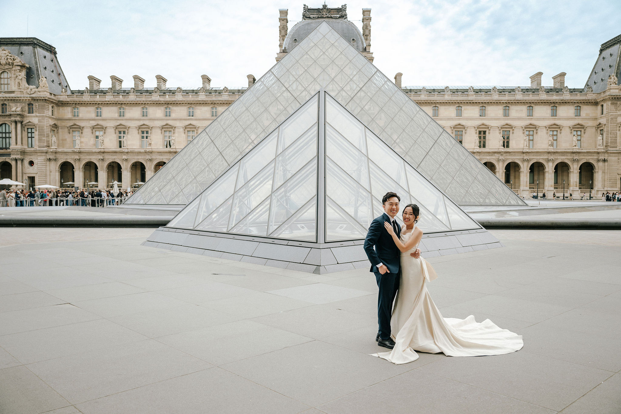 Paris Pre-Wedding Photoshoot | Place du Trocadéro, Bir-Hakeim Bridge, Louvre Pyramid, Tuileries Garden & Montmartre at Louvre Pyramid pre-wedding photo