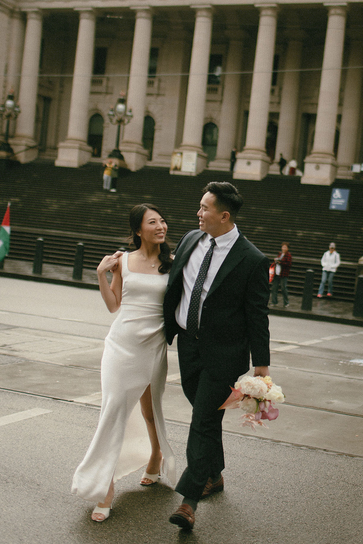 Melbourne Pre-Wedding Photoshoot | Parliament House, Fitzroy Gardens, Melbourne Streets & Half Moon Bay at Parliament House pre-wedding photo