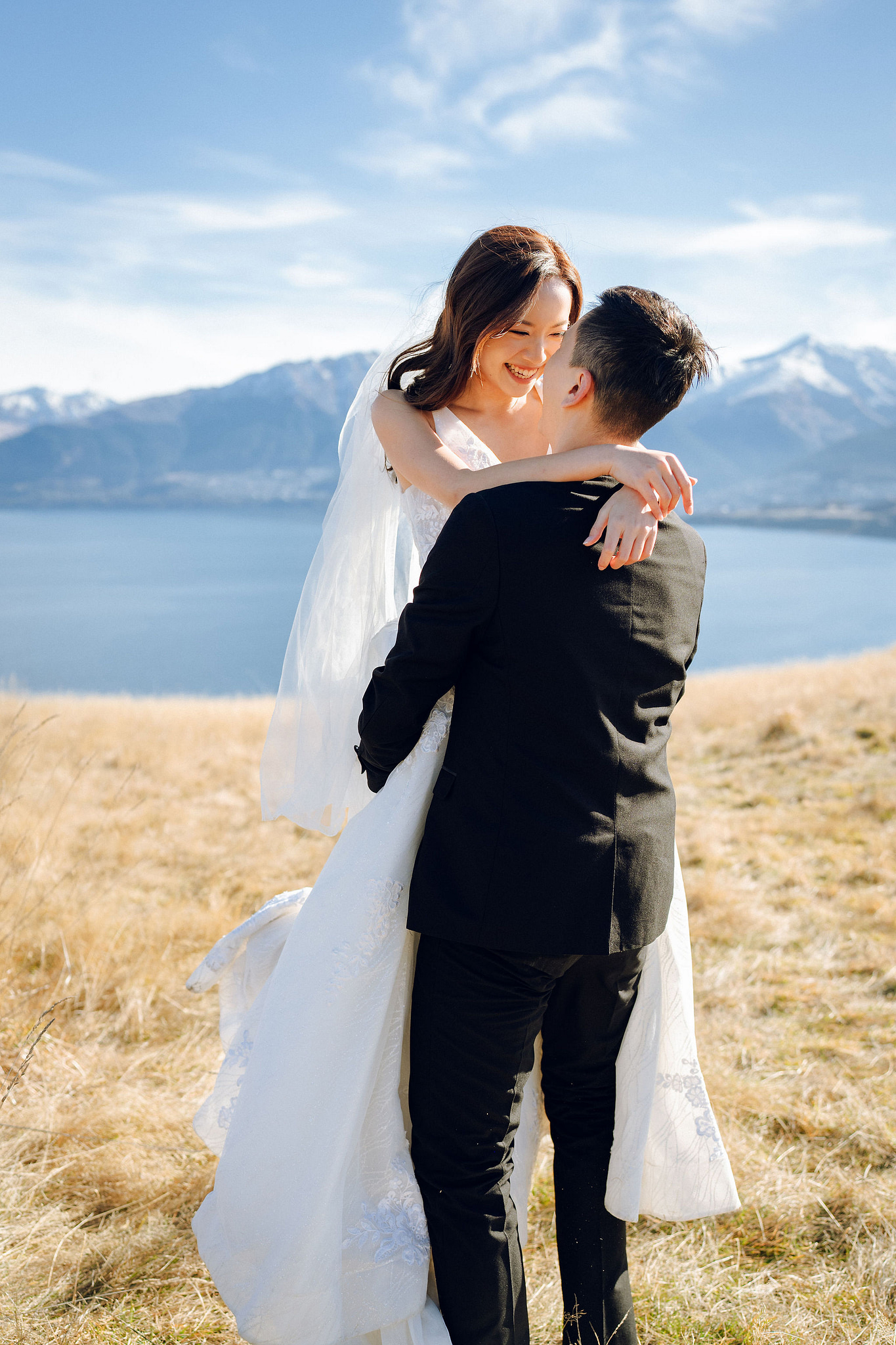 New Zealand Pre-Wedding Photoshoot with Lake Wakatipu, Skippers Canyon, Lake Tekapo, Mount Cook, and Omarama Clay Cliffs at Lake Wakatipu pre-wedding photo