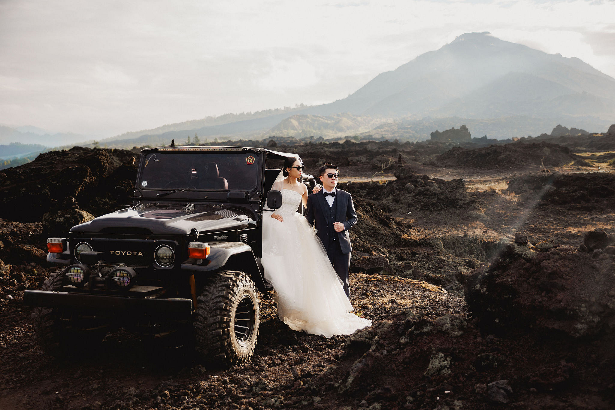 Bali Pre-Wedding Photoshoot | Mt. Batur Lava Fields, Blangsinga Waterfall & Balangan Beach at Mt. Batur Lava Fields pre-wedding photo
