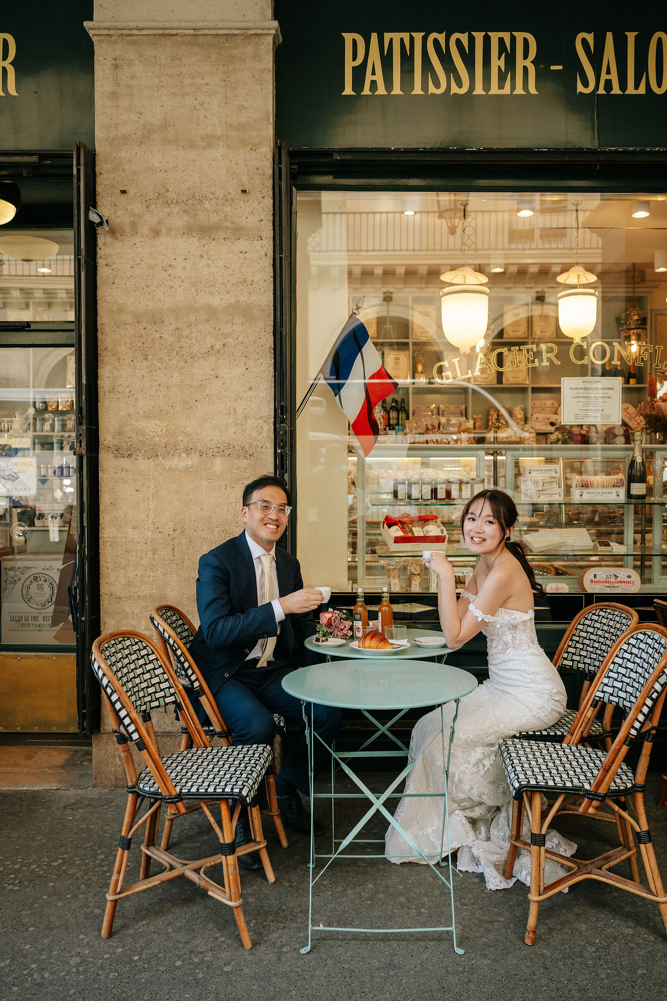 Paris Pre-Wedding Photoshoot | Place du Trocadéro, Port Debilly, Petit Palais, Pont Alexandre III, Parisian Café & Louvre Pyramid at Parisian Café pre-wedding photo