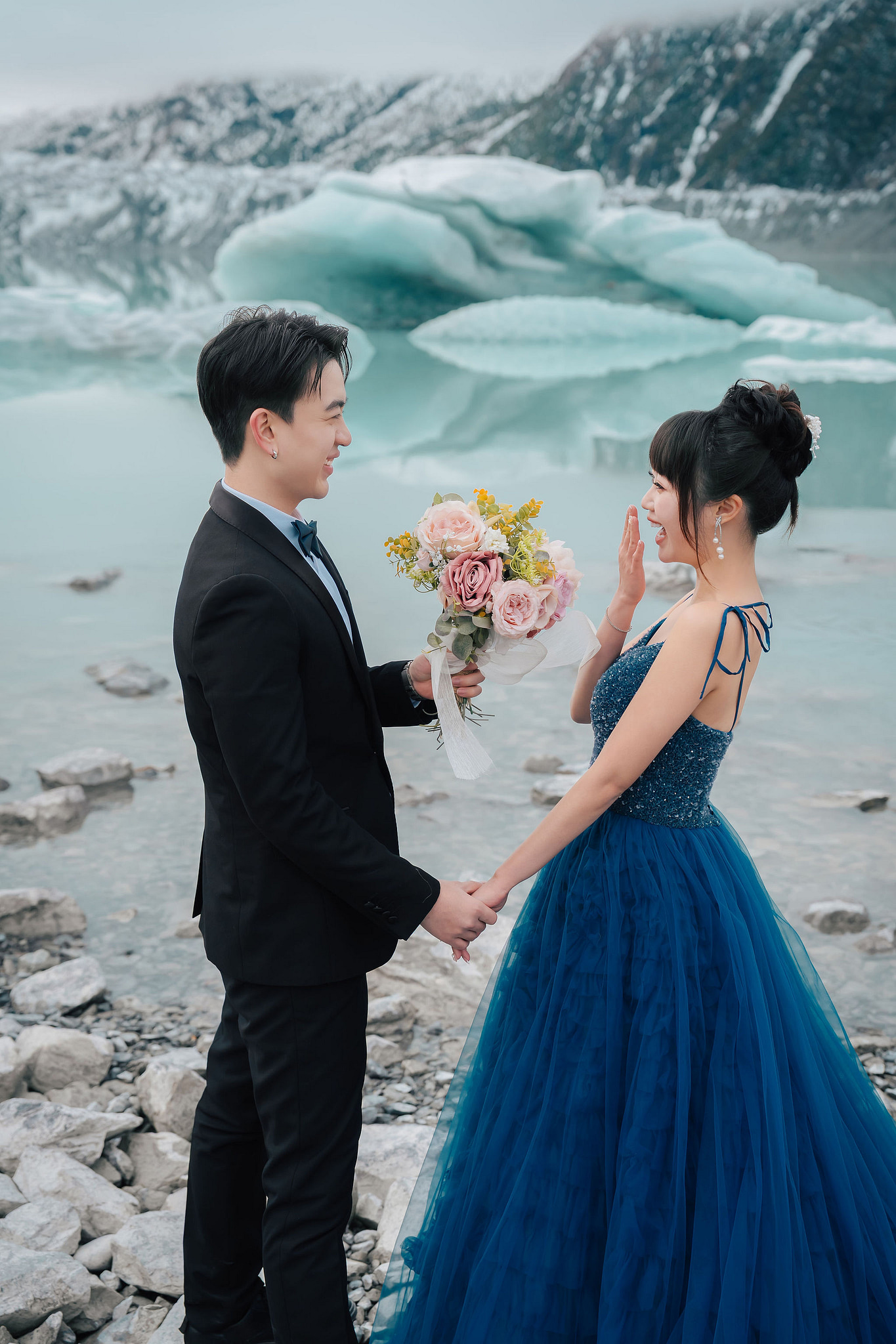 New Zealand Pre-Wedding Photoshoot | Lake Wakatipu, Fog Peak, Lake Tekapo, Glacier & Mount Cook National Park at Glacier pre-wedding photo