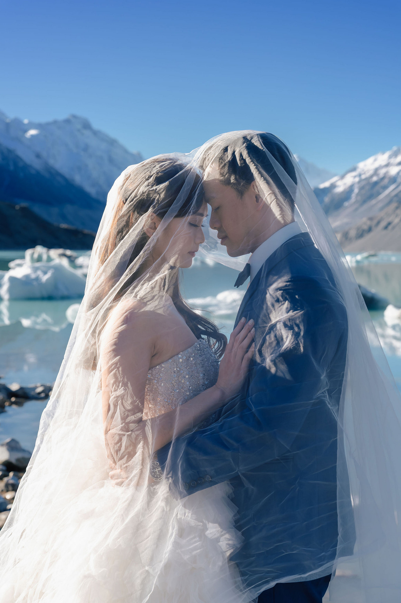 New Zealand Pre-Wedding Photoshoot | Coromandel Peak, Lake Wakatipu & Queenstown, Skippers Canyon, Lake Tekapo, Mount Cook National Park & Glacier at Glacier pre-wedding photo