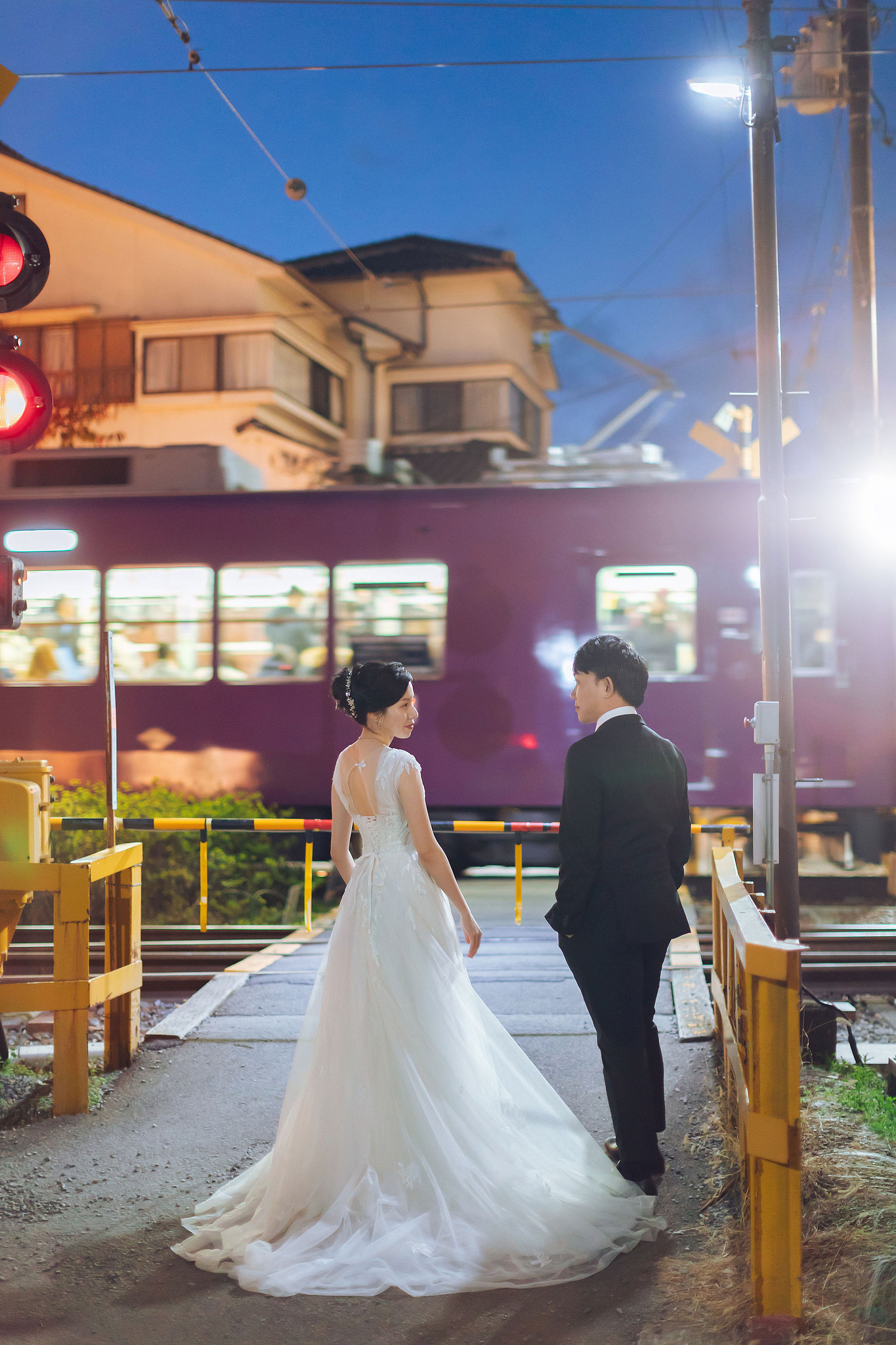 Kyoto Pre-Wedding Photoshoot | Traditional Higashiyama, Arashiyama Hills & Nighttime Railway at Nighttime Railway Crossing pre-wedding photo