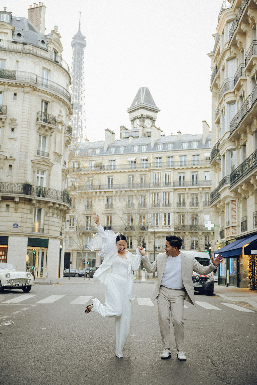 Paris Pre-Wedding Photoshoot with Eiﬀel Tower Louvre Museum Parisian Cafe Vintage Car Rooftop Night at Parisian Streets pre-wedding photo
