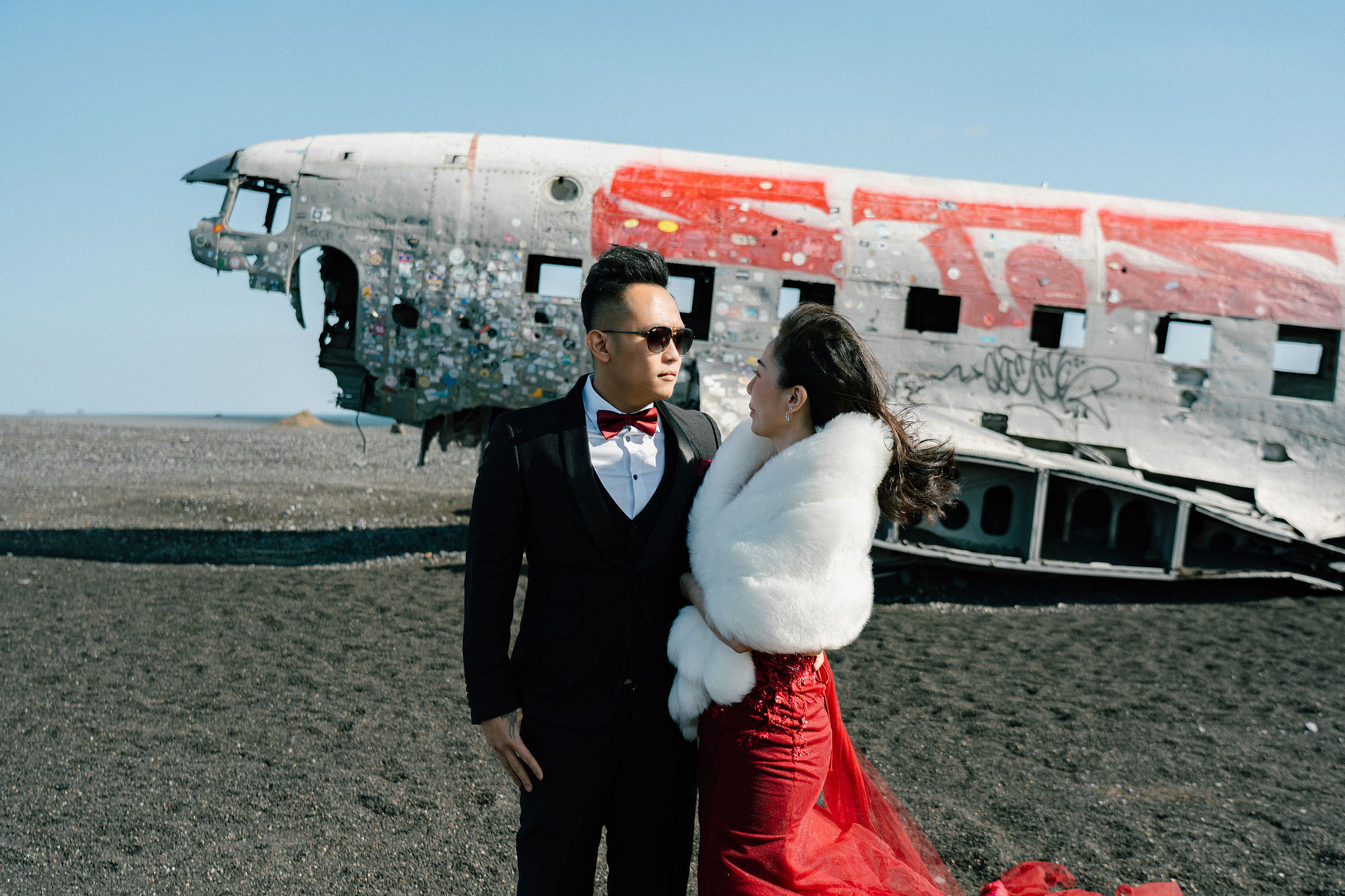 Iceland Pre-Wedding Photoshoot | Hallgrimskirkja, Skogafoss, DC Plane Wreck & Black Sand Beach at DC Plane Wreck pre-wedding photo