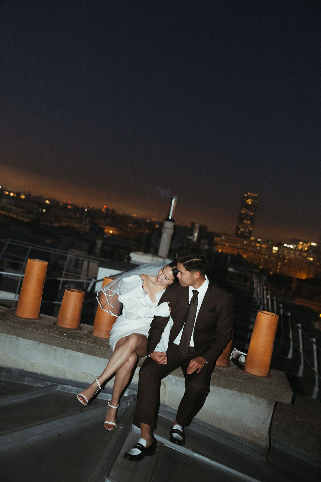 Paris Pre-Wedding Photoshoot with Eiﬀel Tower Louvre Museum Parisian Cafe Vintage Car Rooftop Night at Paris Rooftop pre-wedding photo