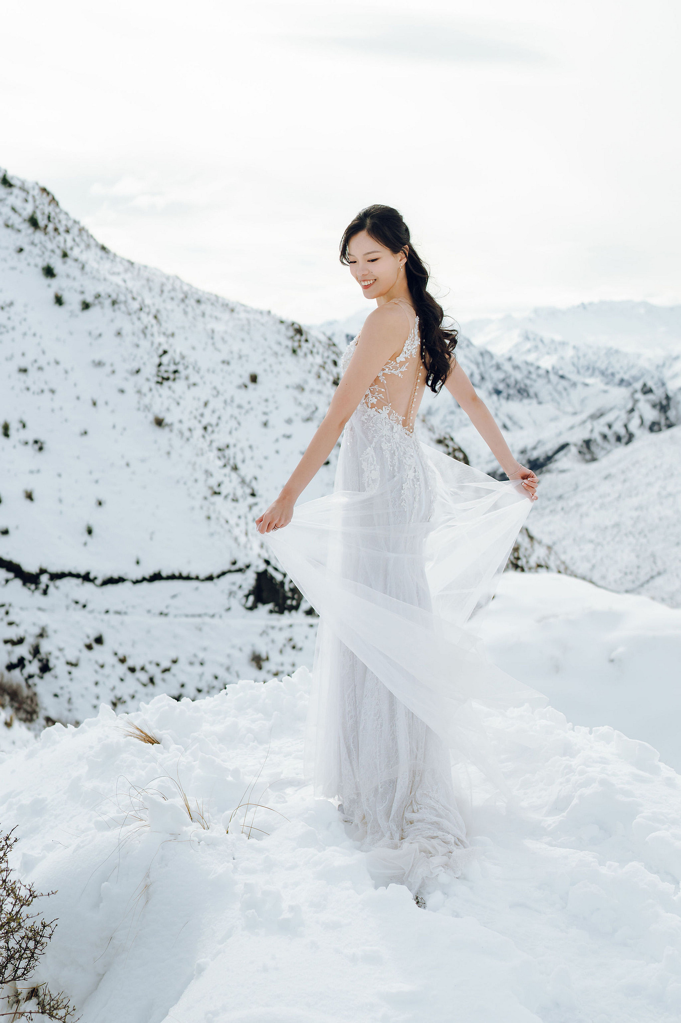 New Zealand Pre-Wedding Photoshoot | Cherry Blossoms, Coromandel Peak & Lake Wakatipu at Coromandel Peak pre-wedding photo