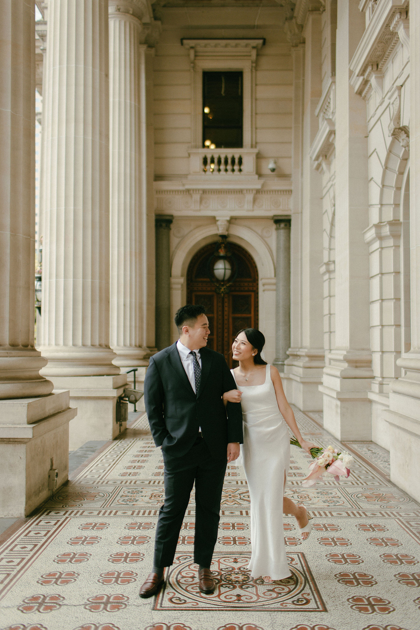 Melbourne Pre-Wedding Photoshoot | Parliament House, Fitzroy Gardens, Melbourne Streets & Half Moon Bay at Parliament House pre-wedding photo