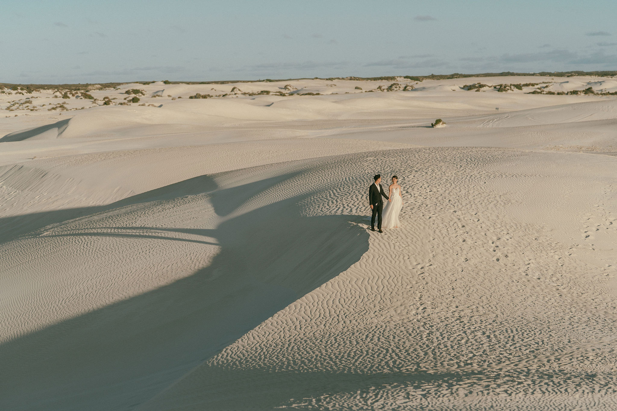 Perth Pre-Wedding Photoshoot | Wanneroo Pines, Yanchep National Park, Lancelin & Lancelin Beach at Lancelin Sand Dunes pre-wedding photo