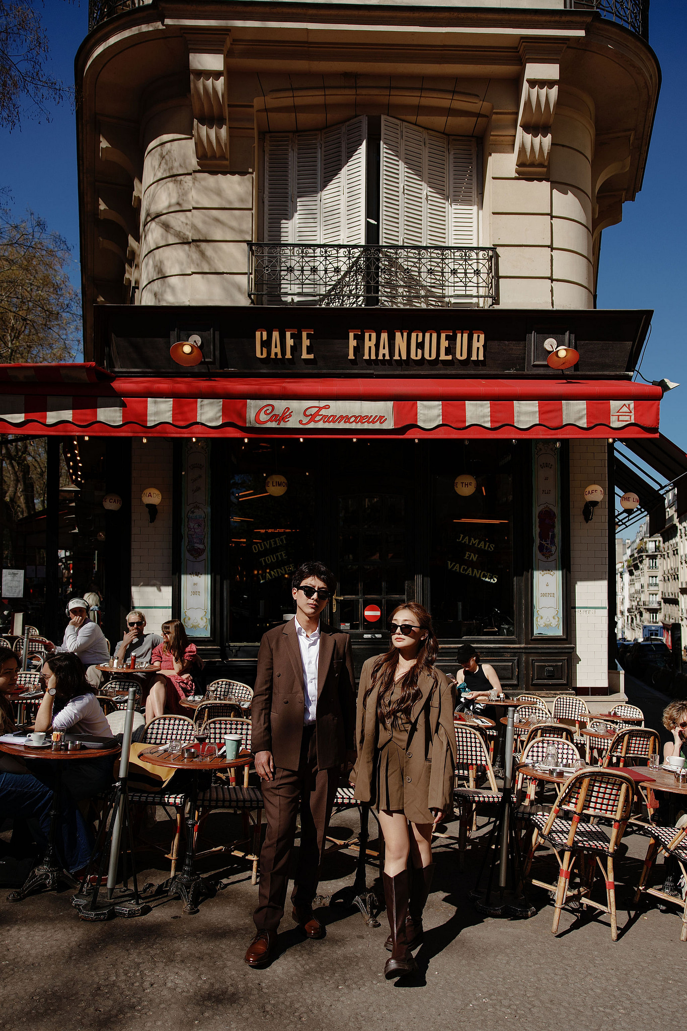 Paris Pre-Wedding Photoshoot | Place du Trocadéro, Bir-Hakeim Bridge, Sacré-Cœur Basilica, Parisian Café & Palais Royal at Parisian Café pre-wedding photo