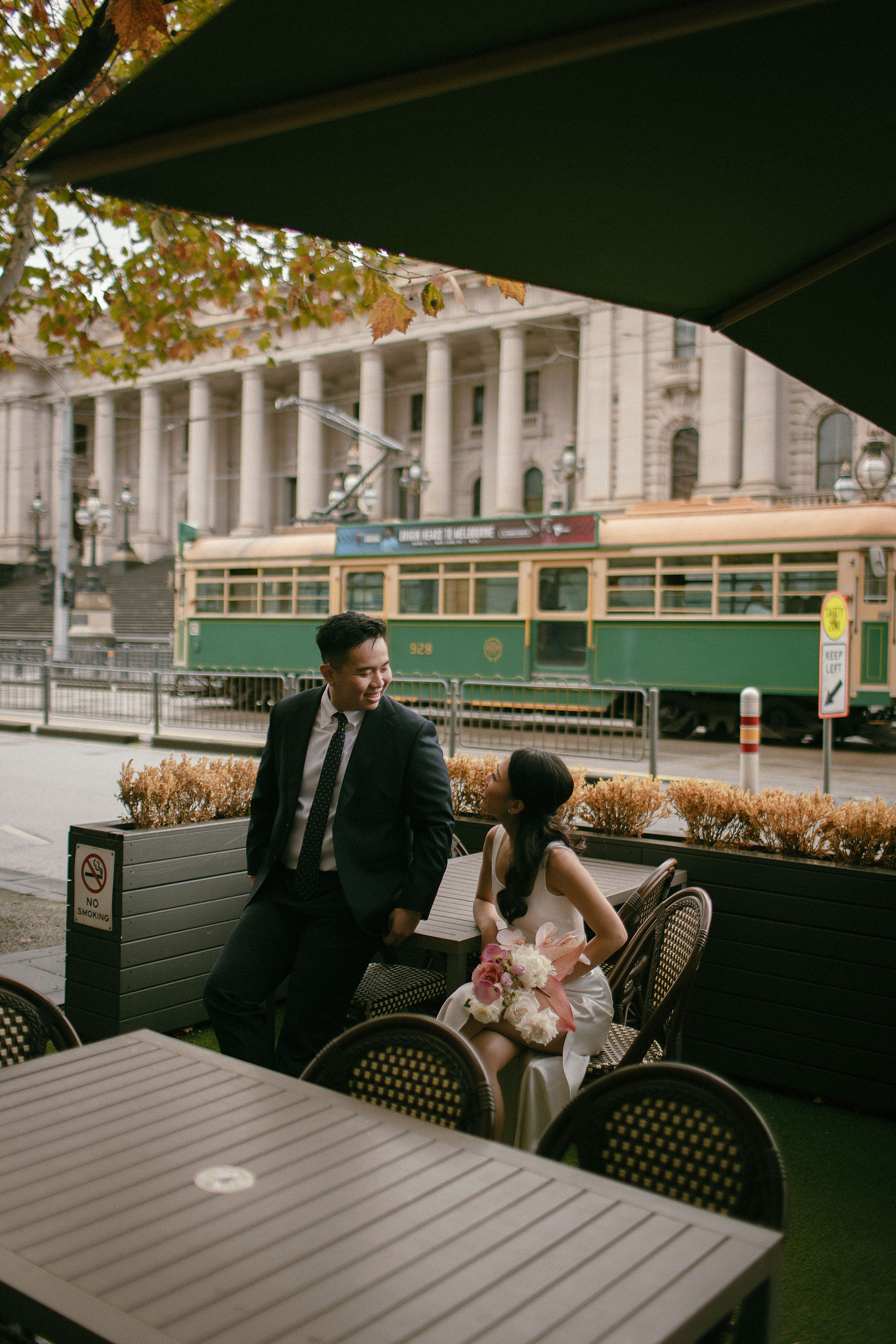 Melbourne Pre-Wedding Photoshoot | Parliament House, Fitzroy Gardens, Melbourne Streets & Half Moon Bay at Parliament House pre-wedding photo