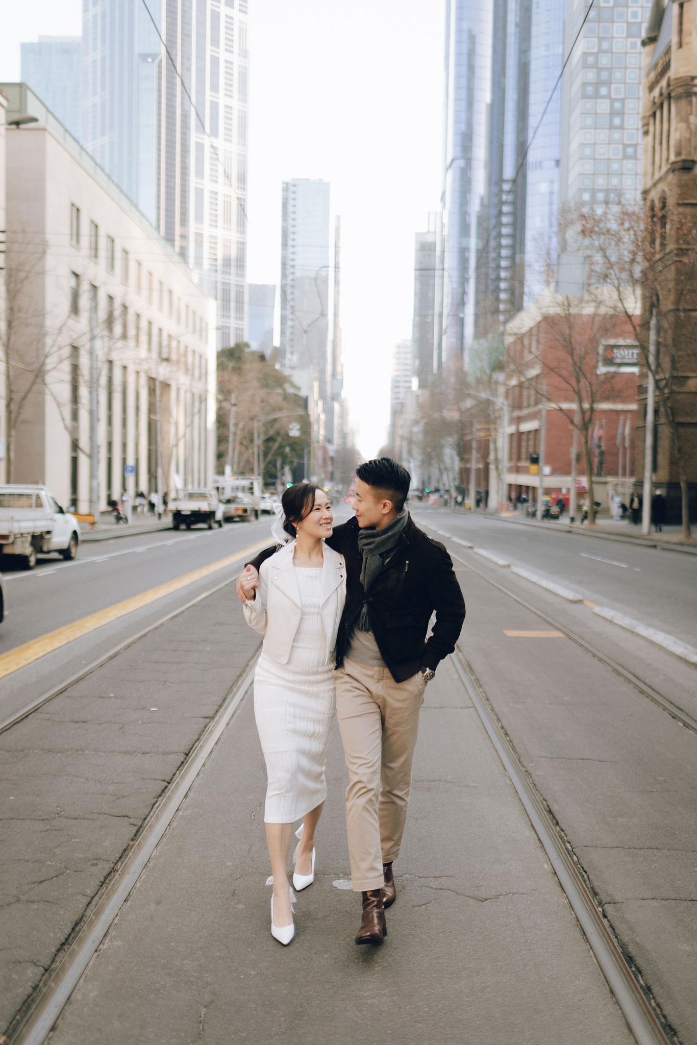 Melbourne Pre-Wedding Photoshoot | Cafe, Redwood Forest, City Streets & Carlton Gardens at Melbourne City Streets pre-wedding photo
