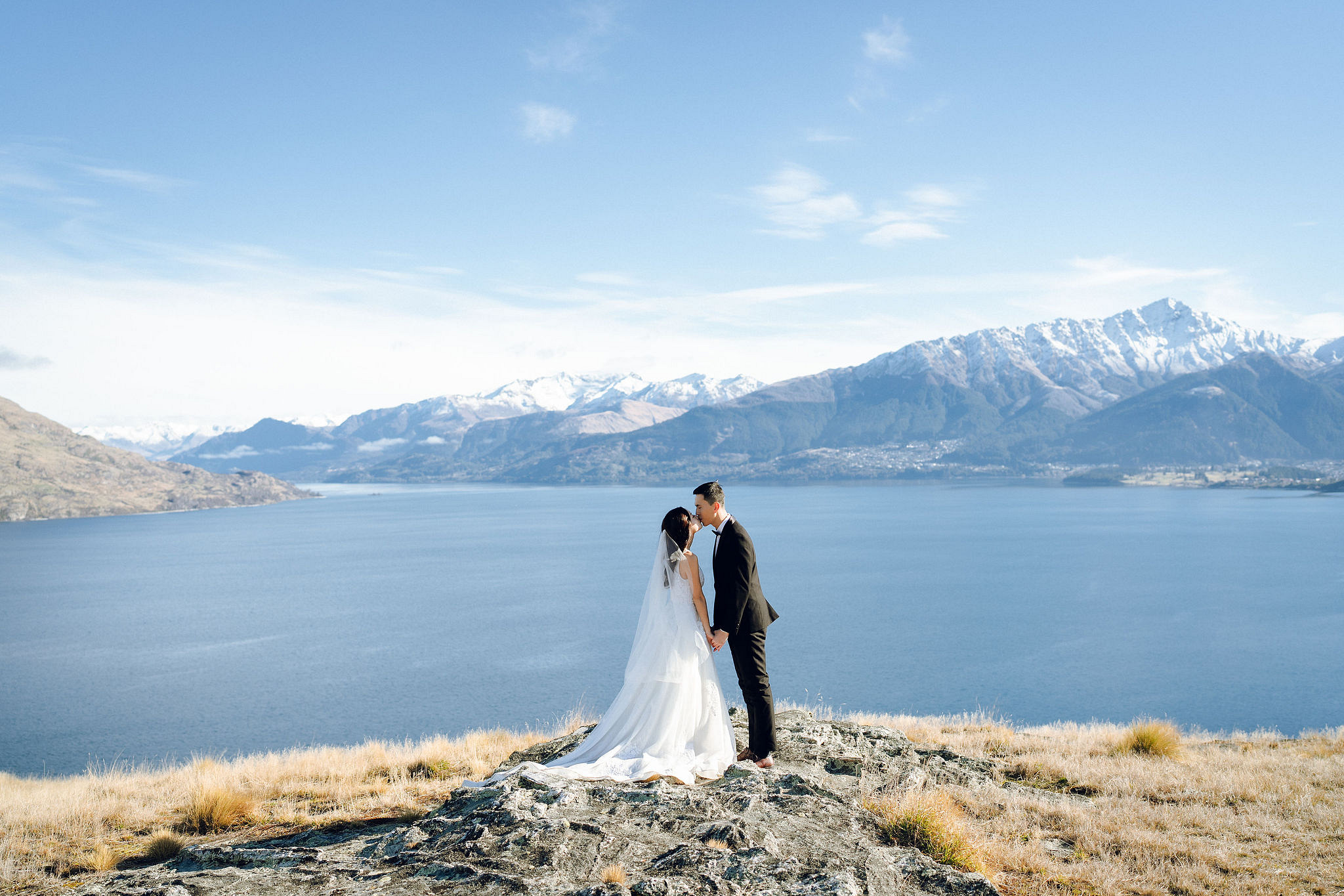 New Zealand Pre-Wedding Photoshoot with Lake Wakatipu, Skippers Canyon, Lake Tekapo, Mount Cook, and Omarama Clay Cliffs at Lake Wakatipu pre-wedding photo