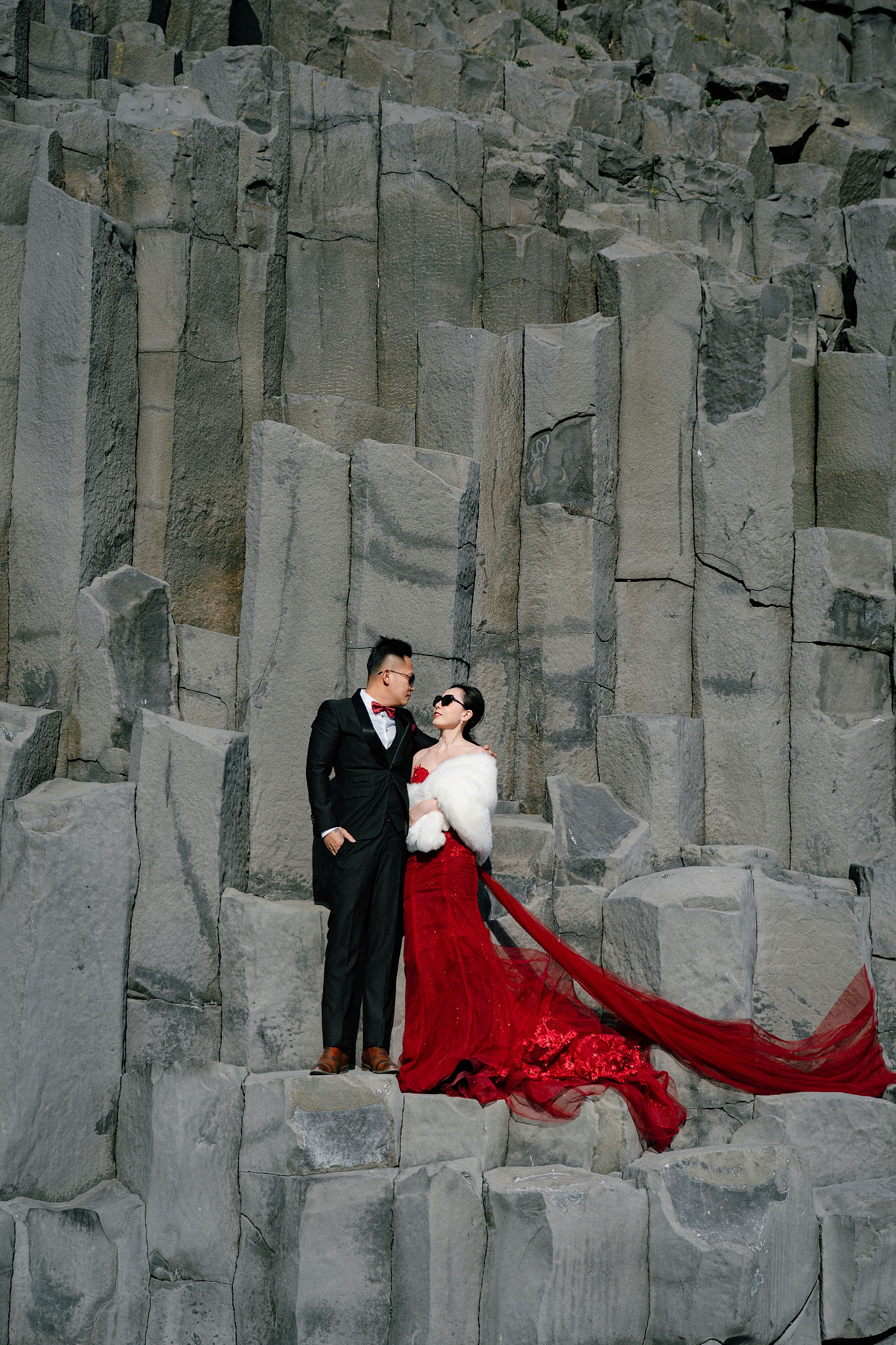 Iceland Pre-Wedding Photoshoot | Hallgrimskirkja, Skogafoss, DC Plane Wreck & Black Sand Beach at Black Sand Beach & Vik Church pre-wedding photo