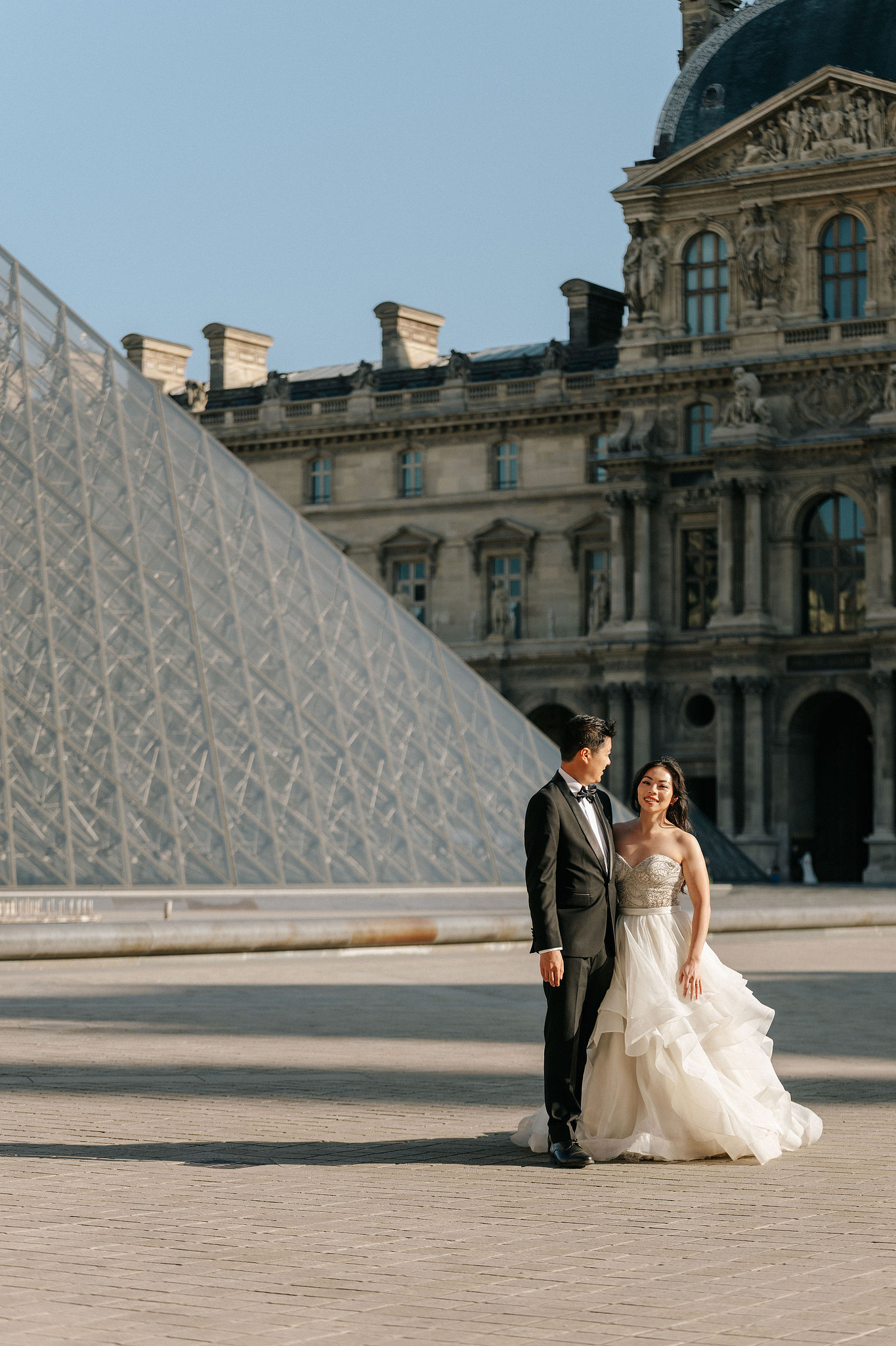 Paris Pre-Wedding Photoshoot | Place du Trocadéro, Port Debilly, Louvre, Parisian Streets & Bir-Hakeim Bridge at Louvre pre-wedding photo
