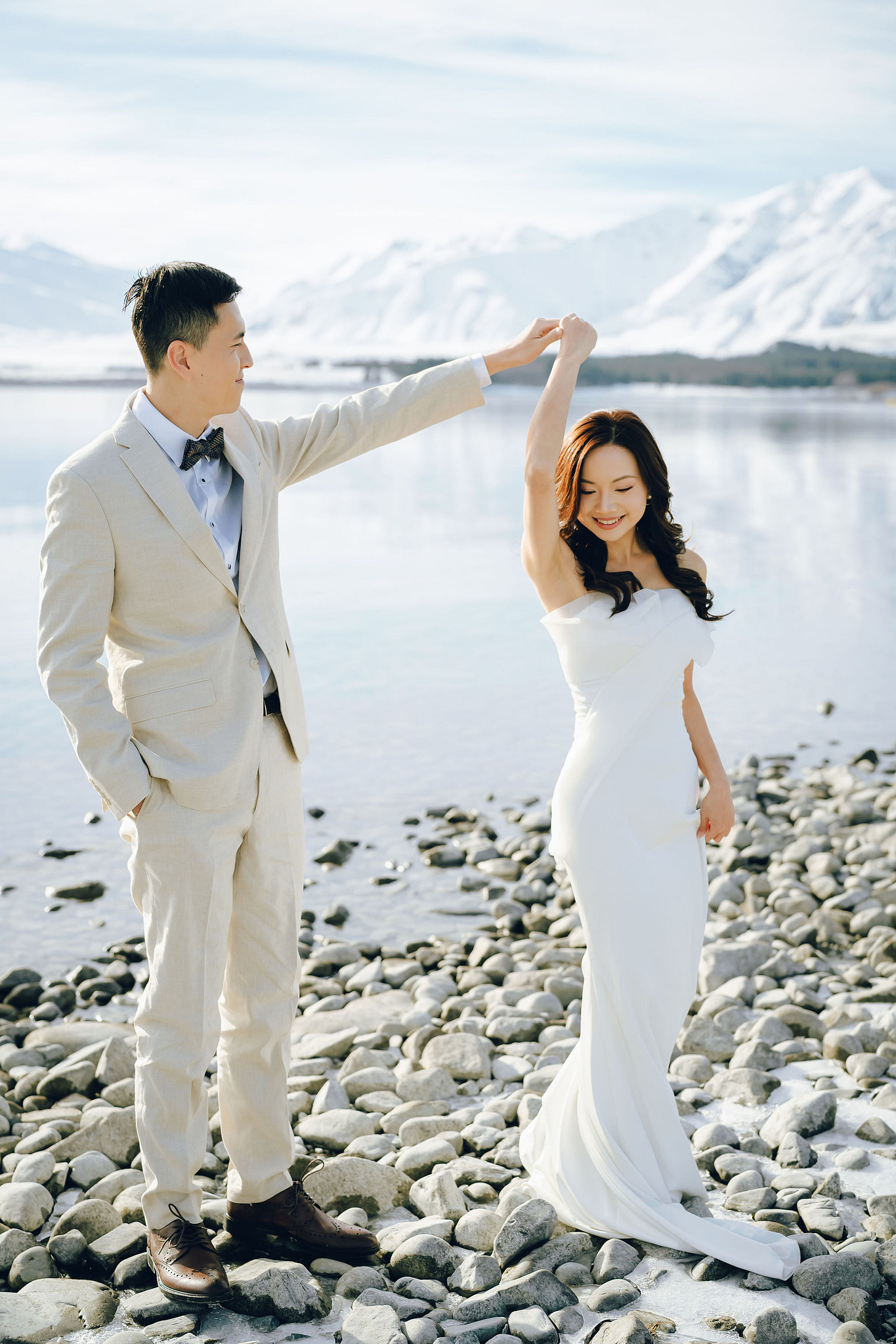 New Zealand Pre-Wedding Photoshoot with Lake Wakatipu, Skippers Canyon, Lake Tekapo, Mount Cook, and Omarama Clay Cliffs at Lake Tekapo & Mount Cook National Park pre-wedding photo